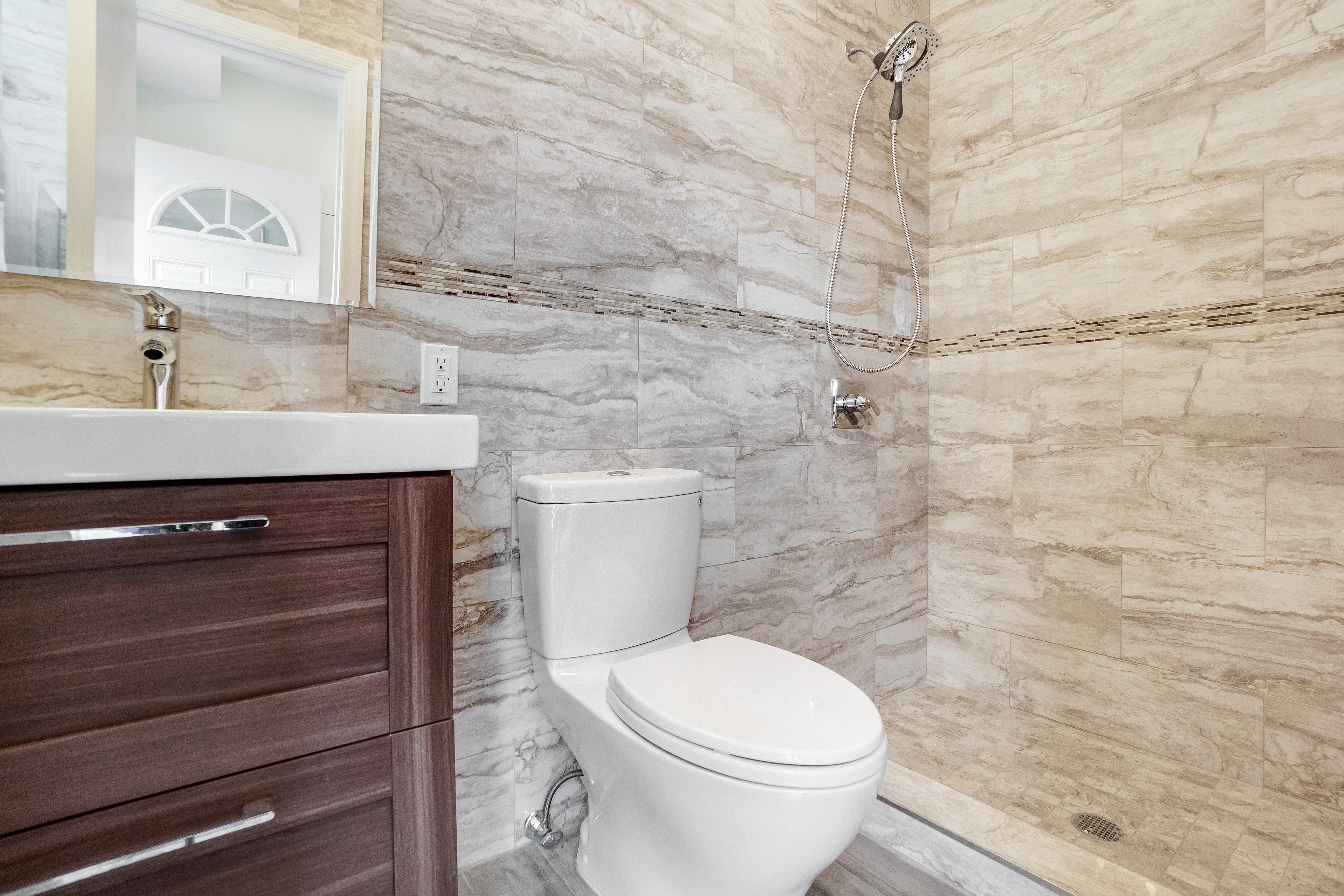 407 Oceanview Avenue, Unit PH Brooklyn, NY 11235 - Photo 14 of 16 a bathroom with a toilet and a sink