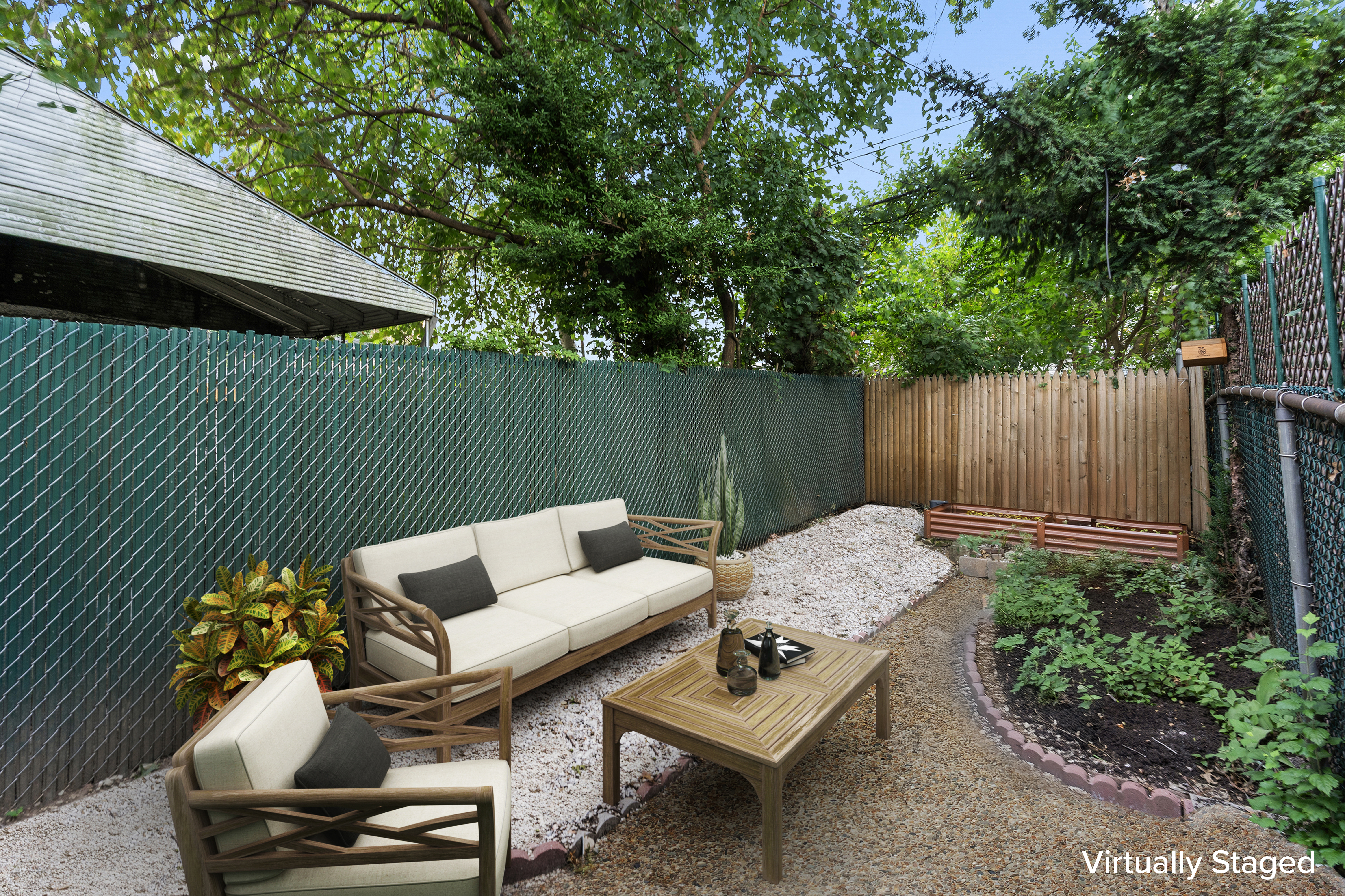 138 East 29th Street Brooklyn, NY 11226 - Photo 10 of 12 a view of backyard with seating area and trees