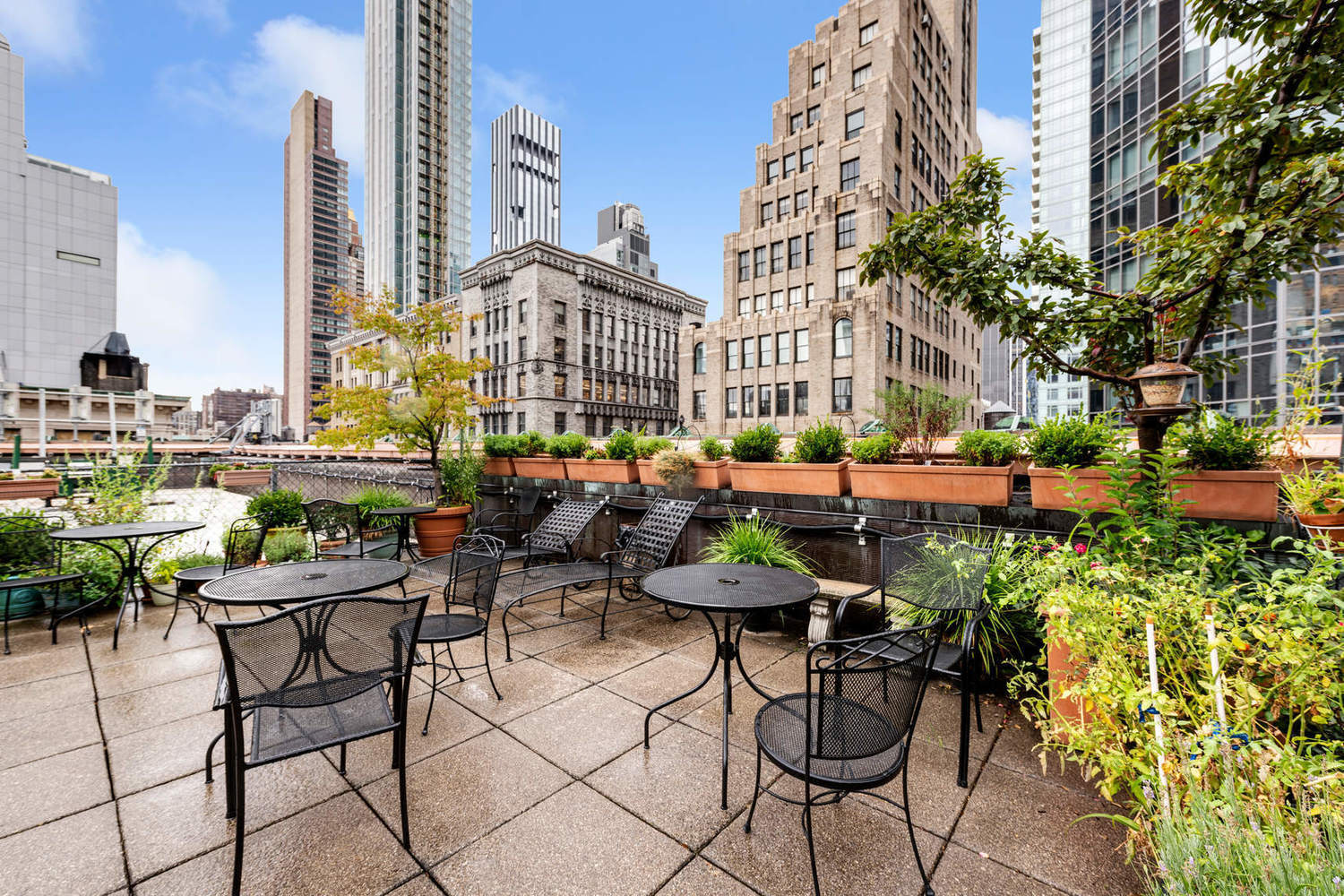 159 Madison Avenue, Unit 4G Manhattan, NY 10016 - Photo 9 of 14 a view of a chairs and table in a patio