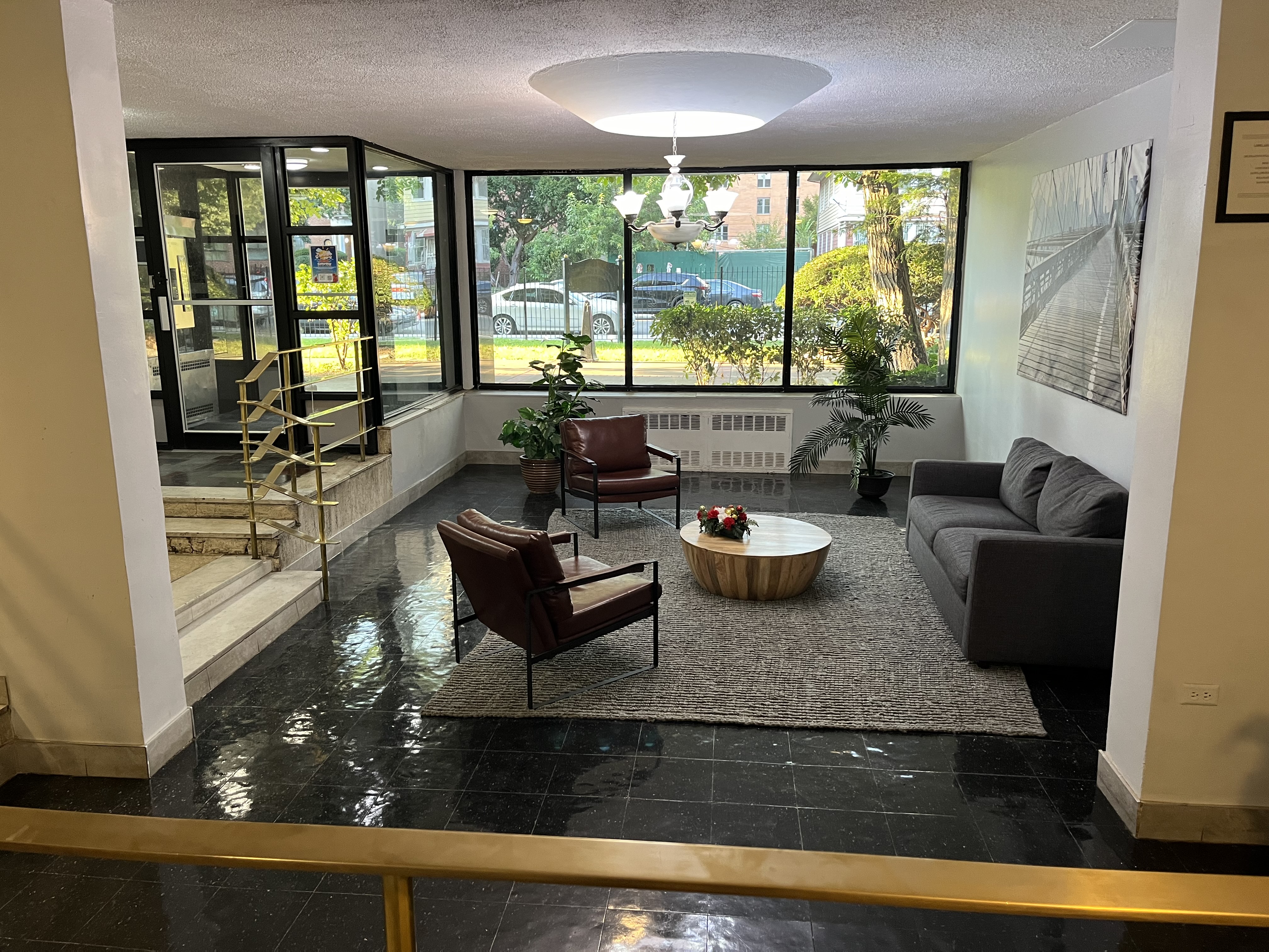 310 Lenox Road, Unit 4D Brooklyn, NY 11226 - Photo 12 of 14 a living room with patio furniture and a large window