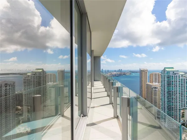 a view of a balcony with city view