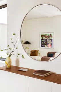a picture of a bathroom with a sink and a mirror