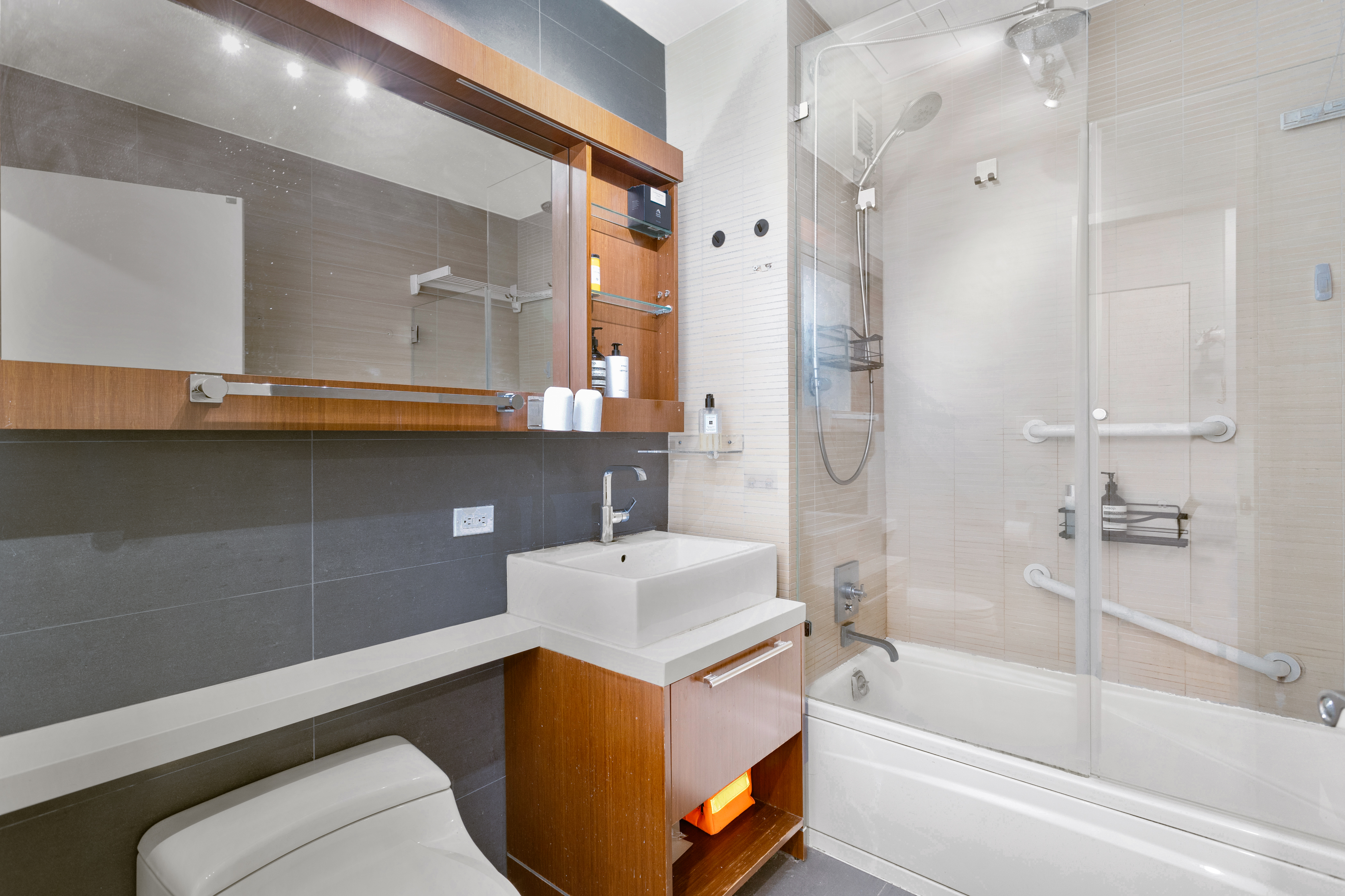305 West 16th Street, Unit 5B Manhattan, NY 10011 - Photo 7 of 15 a bathroom with a bathtub and a sink