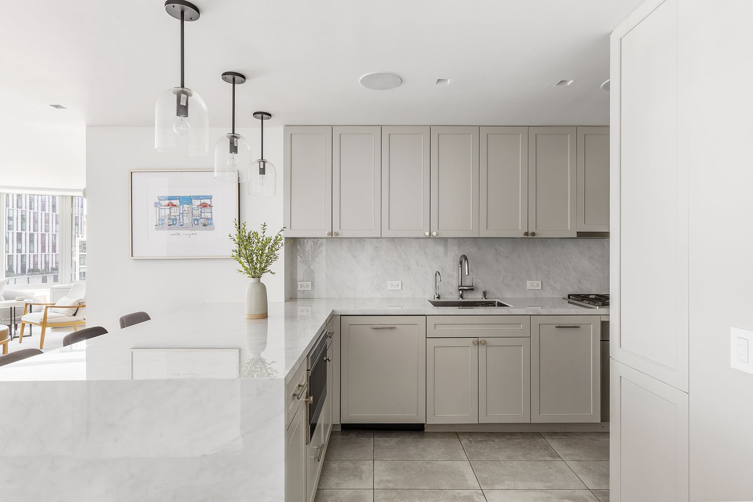 303 Greenwich Street, Unit 8DE Manhattan, NY 10013 - Photo 7 of 20 a kitchen with a sink and cabinets