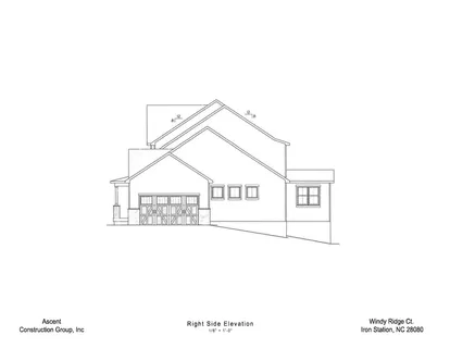 a black and white photo of a bench in a room