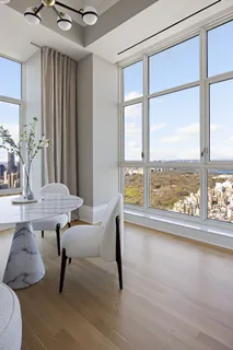 a view of a livingroom with furniture and window