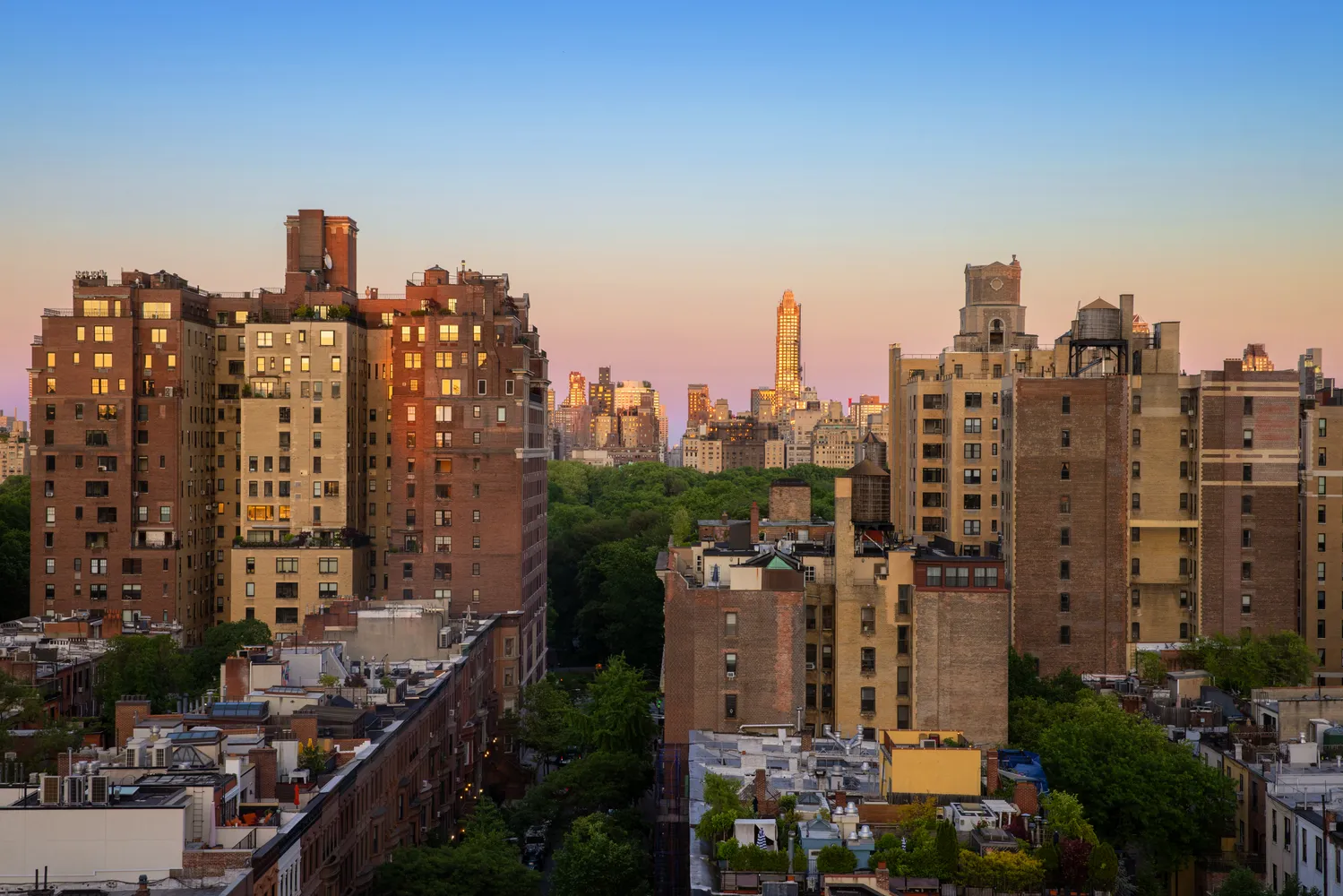 a view of a city with tall buildings