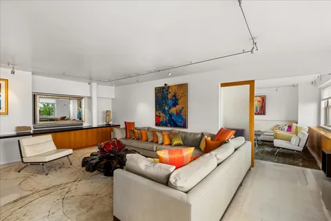 a living room with furniture and a couch