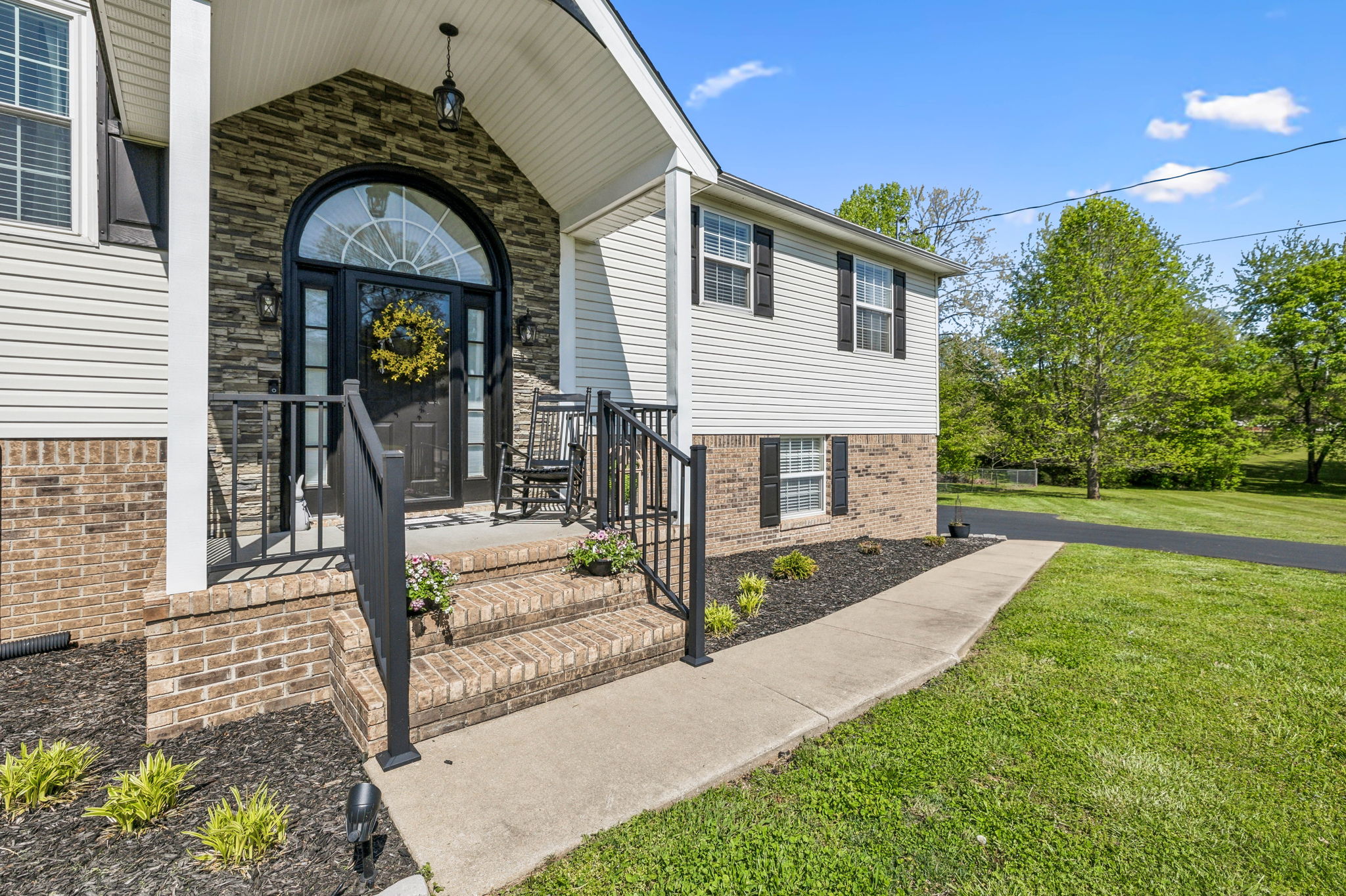 405 Billy Lane Spring Hill, TN 37174 - Photo 6 of 39 a front view of a house with garden