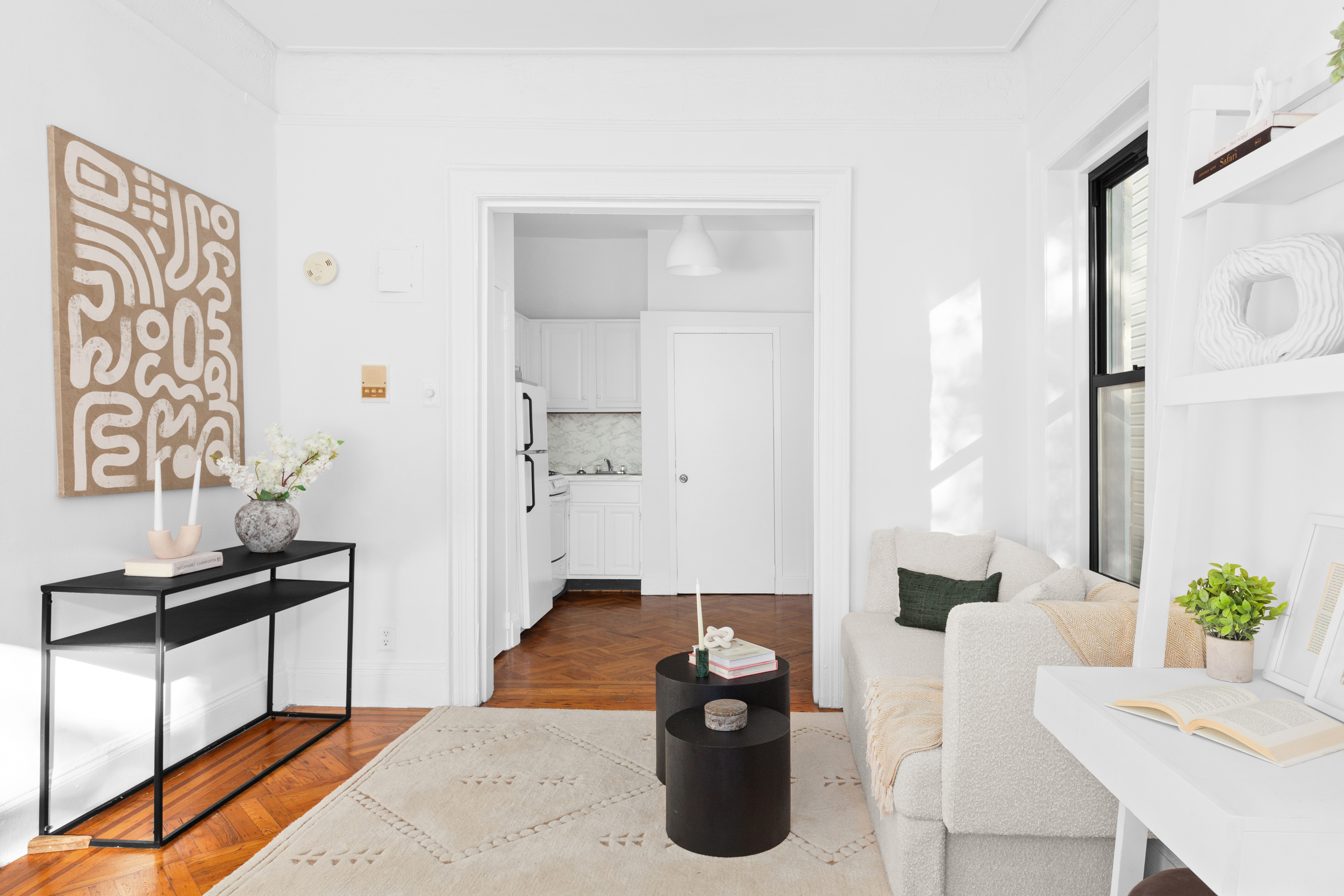 47 Reeve Place, Unit 1 Brooklyn, NY 11218 - Photo 3 of 8 a living room with furniture and a potted plant
