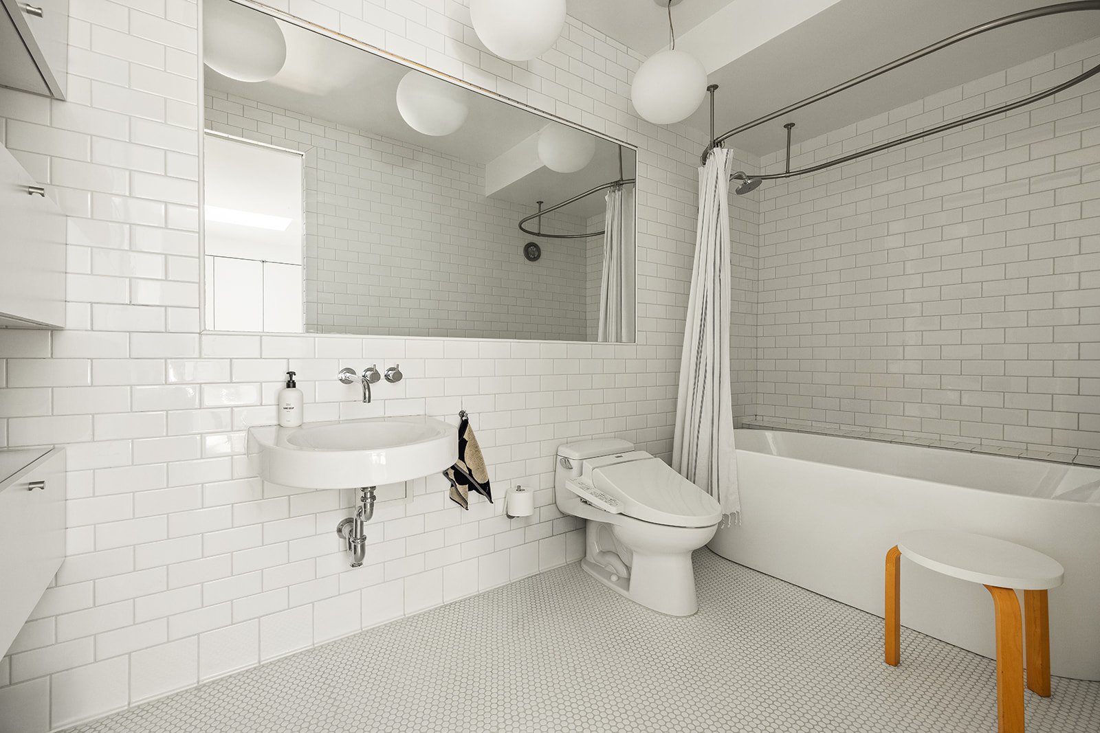 113 2nd Street, Unit 2 Brooklyn, NY 11231 - Photo 12 of 19 a bathroom with a sink toilet and shower