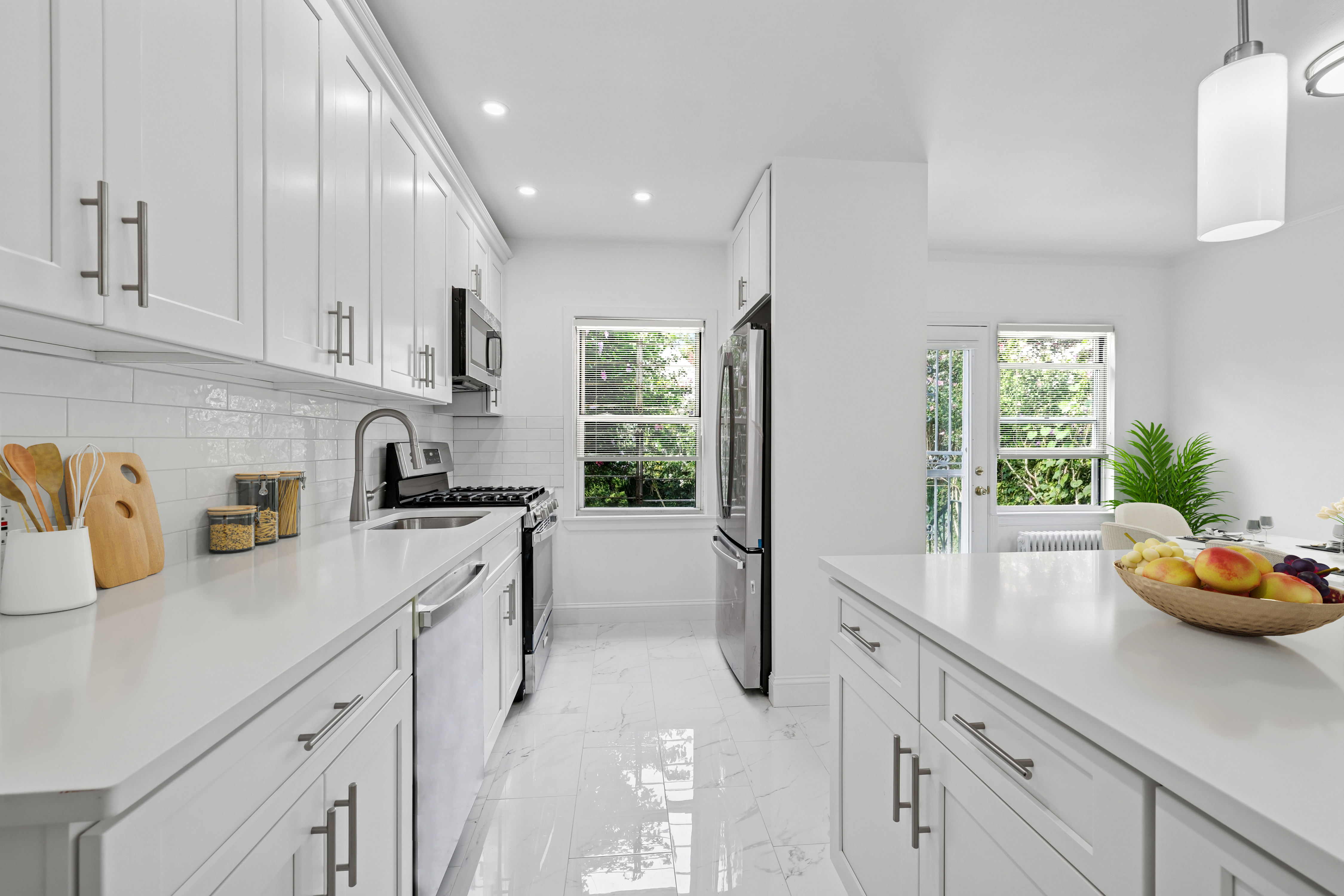 89-36 Springfield Boulevard Queens, NY 11427 - Photo 4 of 13 a kitchen with a sink a refrigerator and cabinets