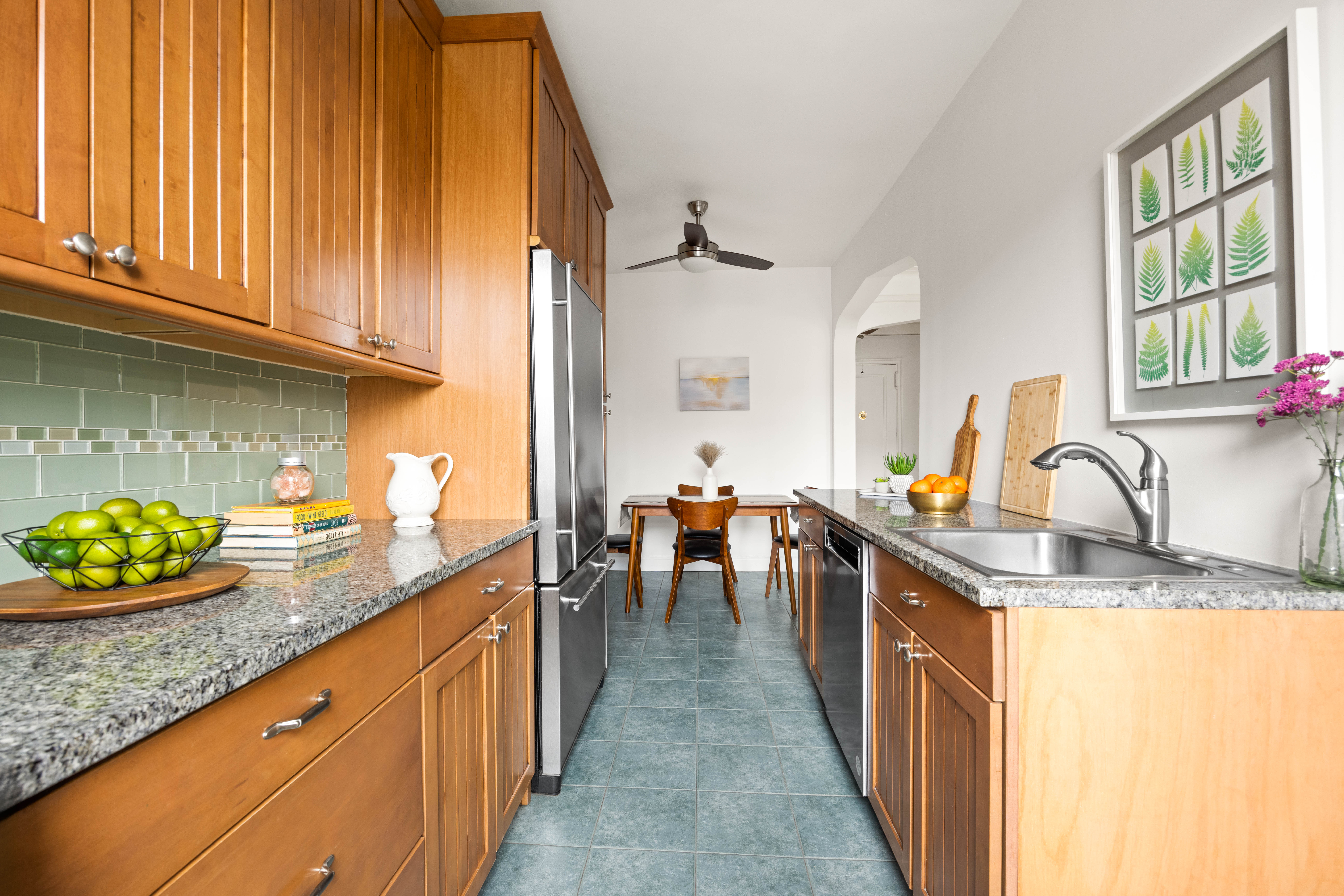 30 Ocean Parkway, Unit 6G Brooklyn, NY 11218 - Photo 4 of 18 a kitchen with stainless steel appliances granite countertop a sink stove and cabinets