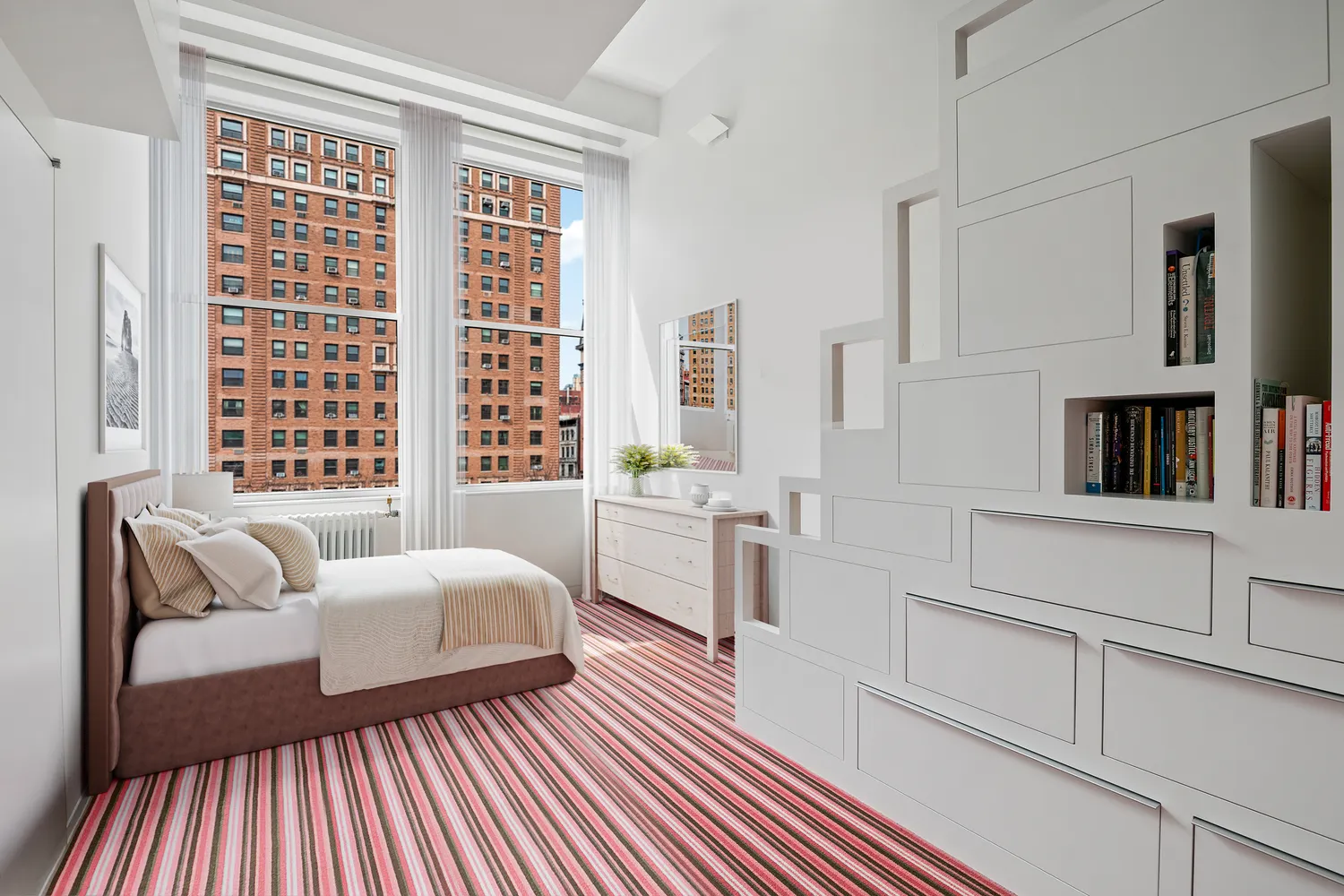 a spacious bedroom with a bed and a couch