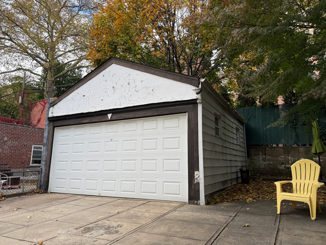 a backyard of a house with seating space