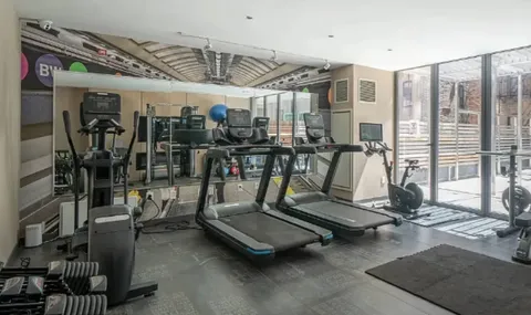 a view of a room with gym equipment