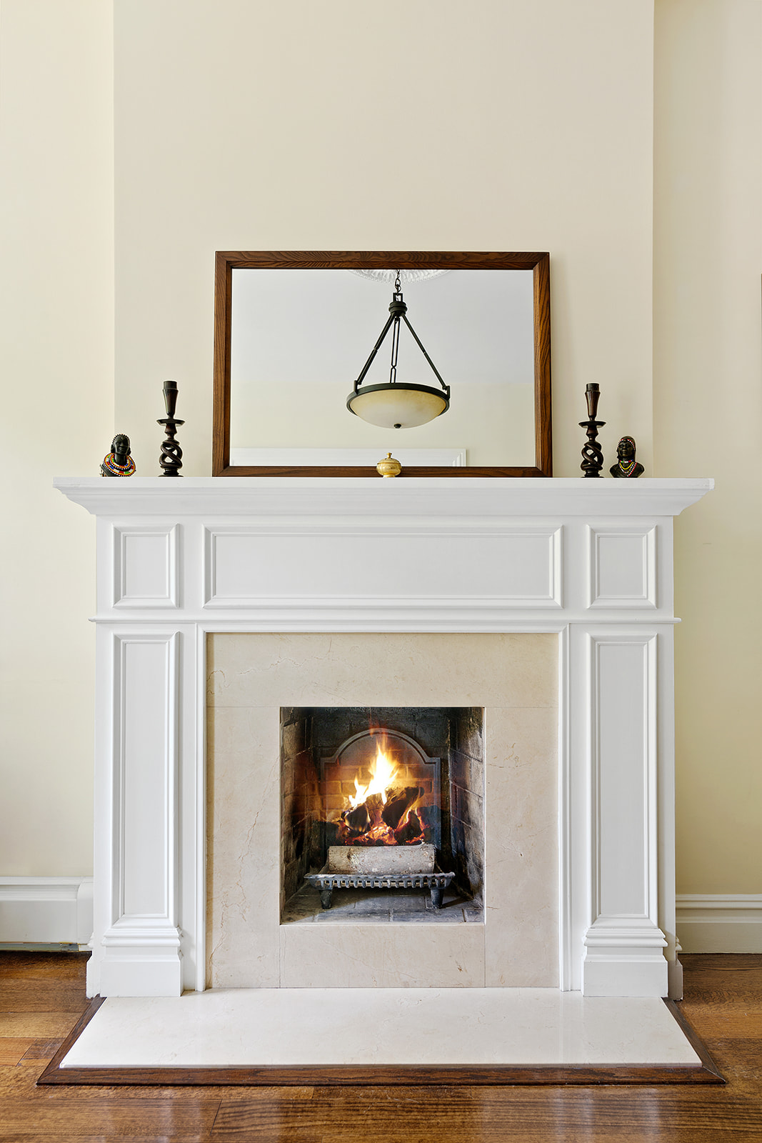 143 Bergen Street, Unit 201 Brooklyn, NY 11217 - Photo 4 of 10 a living room with a fireplace and a ceiling fan