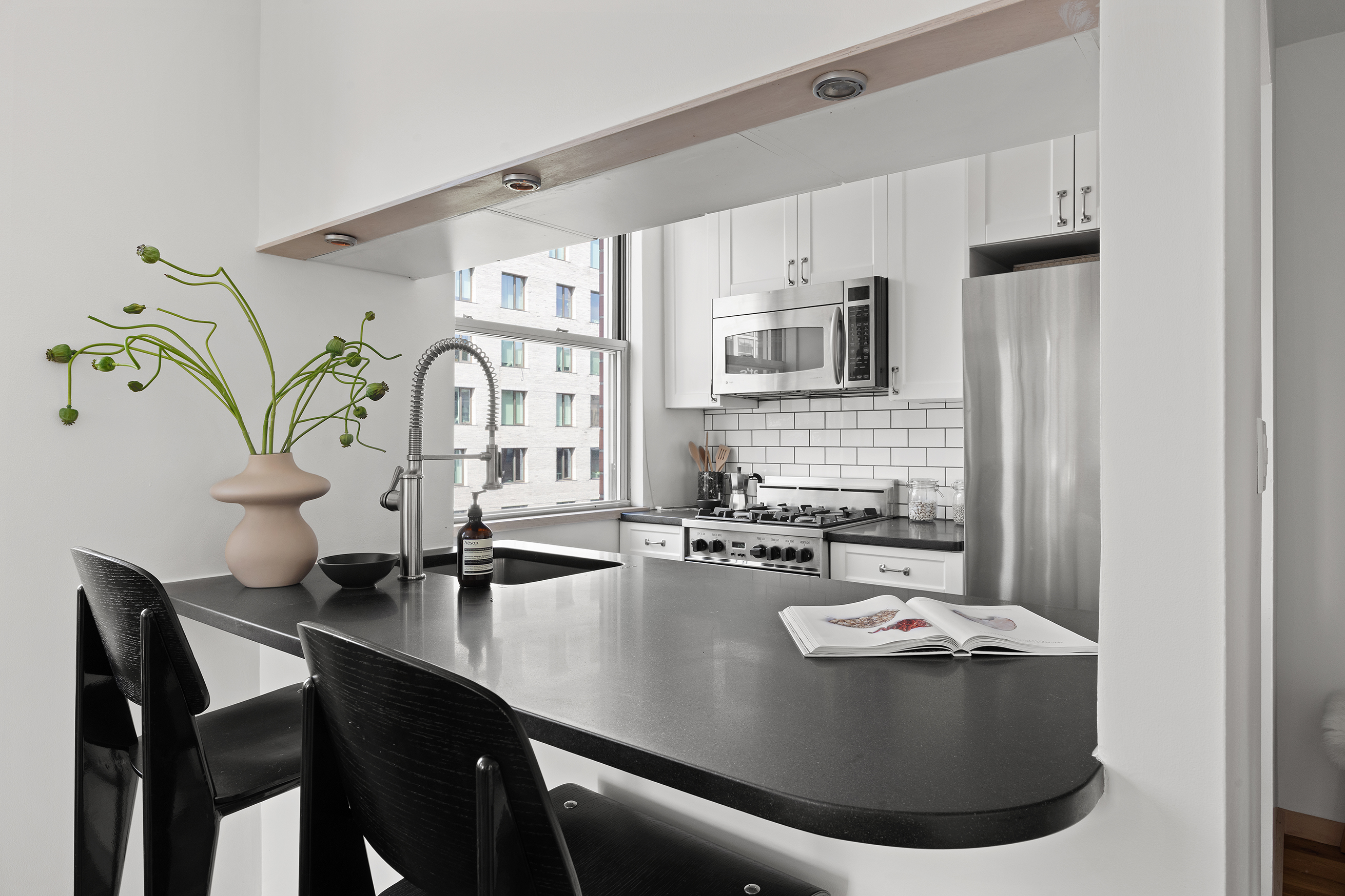 350 West 14th Street, Unit 6D Manhattan, NY 10014 - Photo 6 of 16 a view of kitchen island with appliances and cabinets