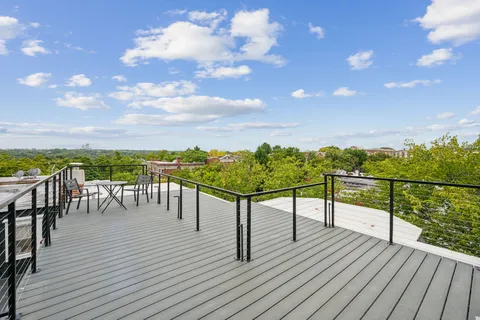 a view of a chairs and table in the terrace