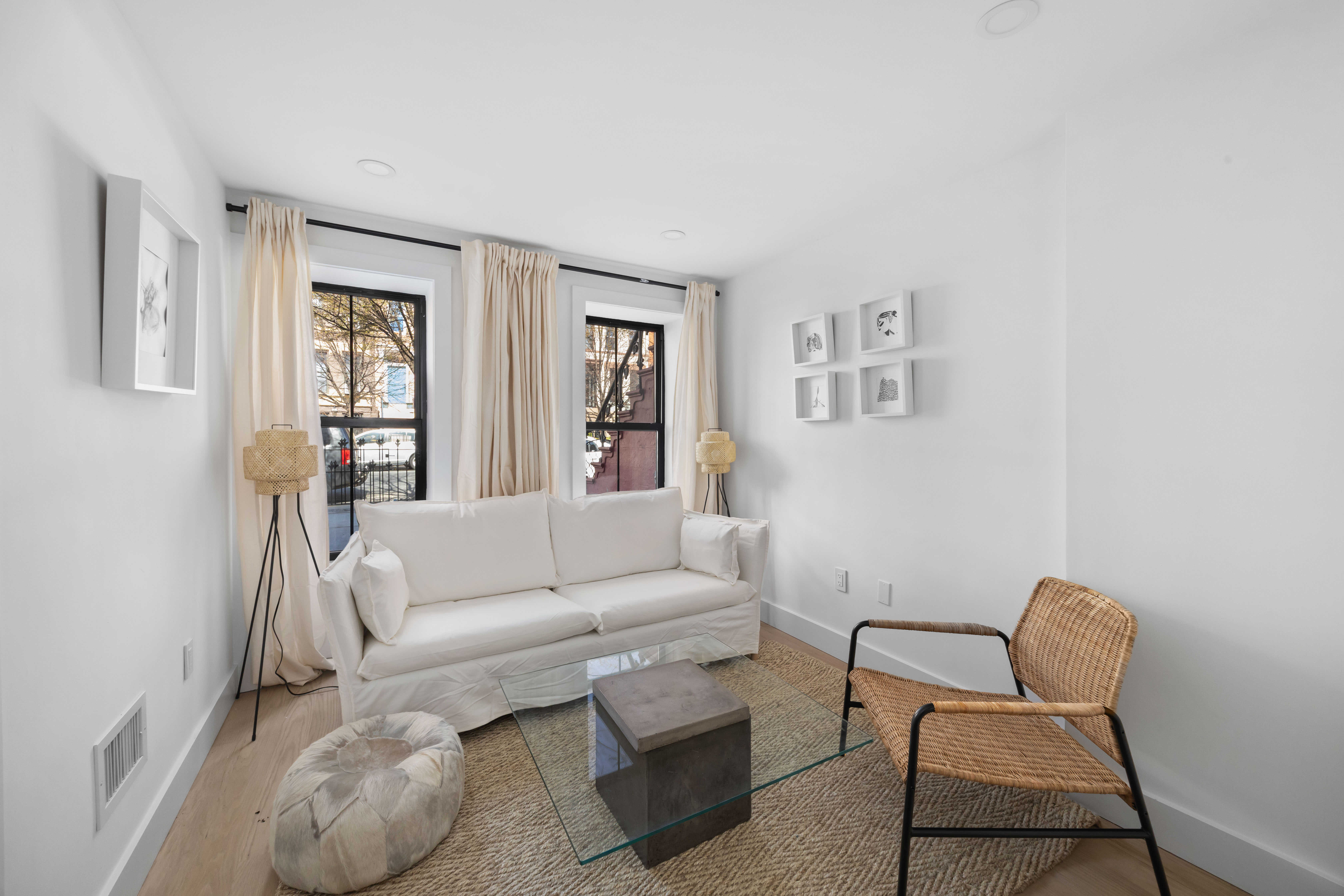 1000 Putnam Avenue Brooklyn, NY 11221 - Photo 12 of 17 a living room with furniture and a window