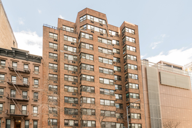 233 East 69th Street, Unit 16F Manhattan, NY 10021 - Photo 6 of 11 a front view of a building