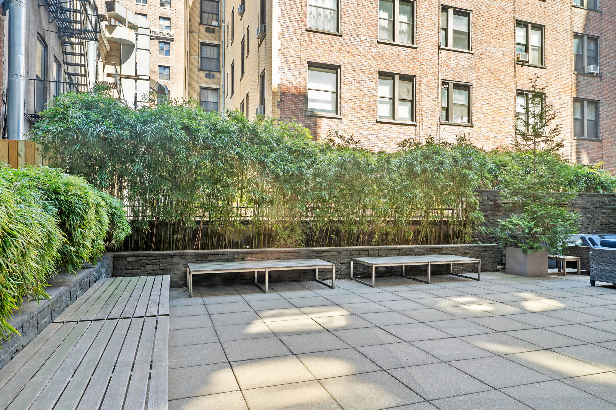 545 West 110th Street, Unit 5A Manhattan, NY 10025 - Photo 10 of 20 a view of a chairs and table on the terrace
