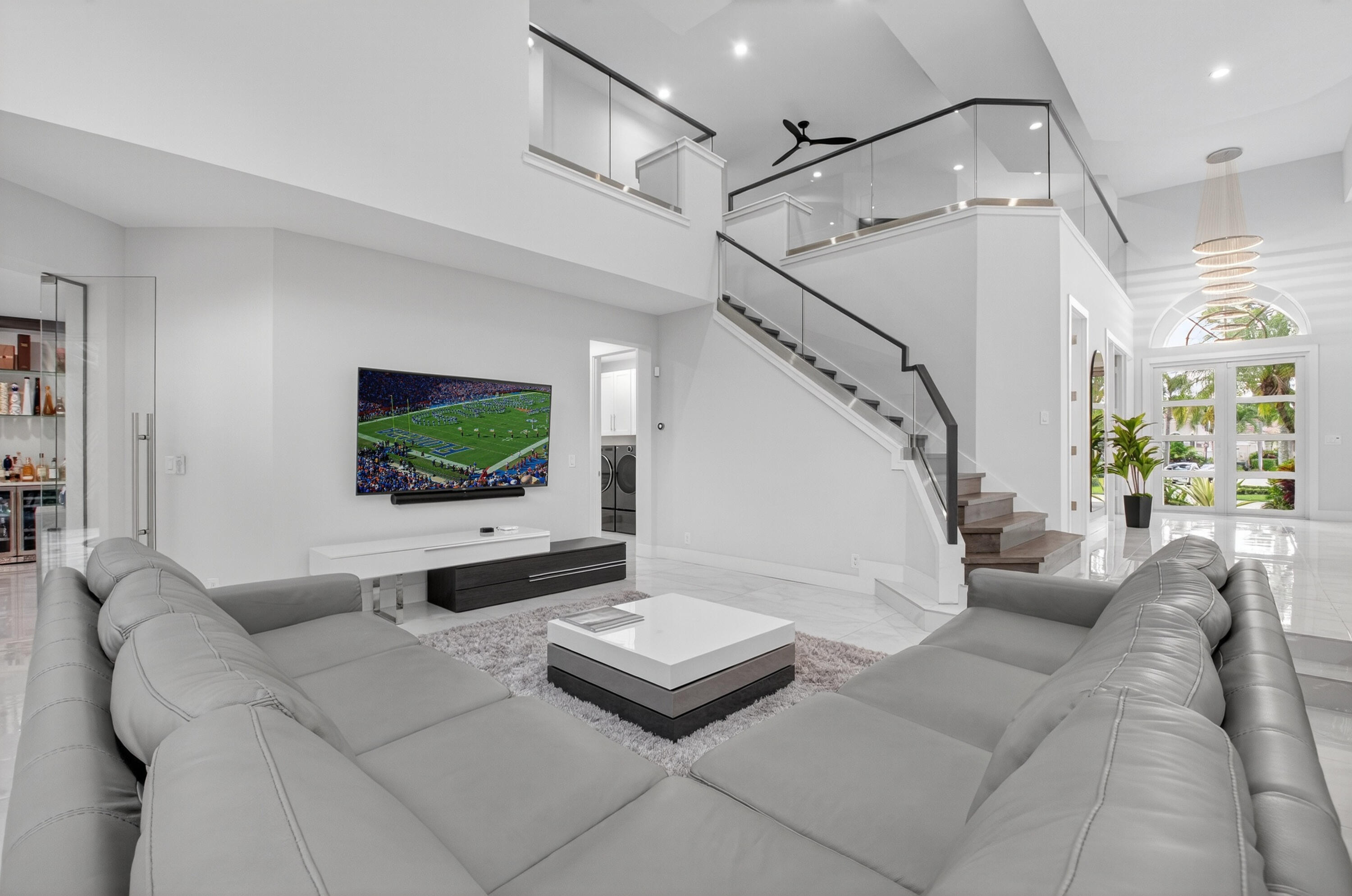 6529 Somerset Circle Boca Raton, FL 33496 - Photo 15 of 75 a living room with furniture and a flat screen tv
