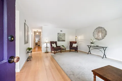 a view of a livingroom with furniture and a couch