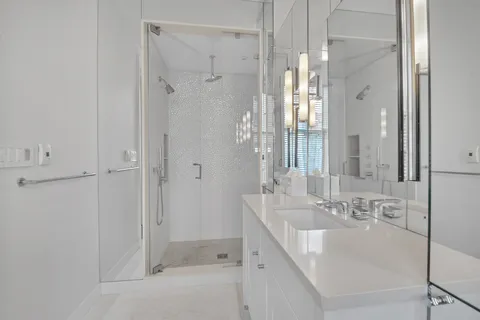 a bathroom with a bathtub and a sink