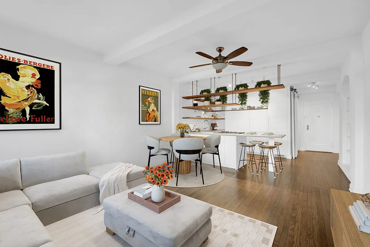 a living room with furniture and kitchen view