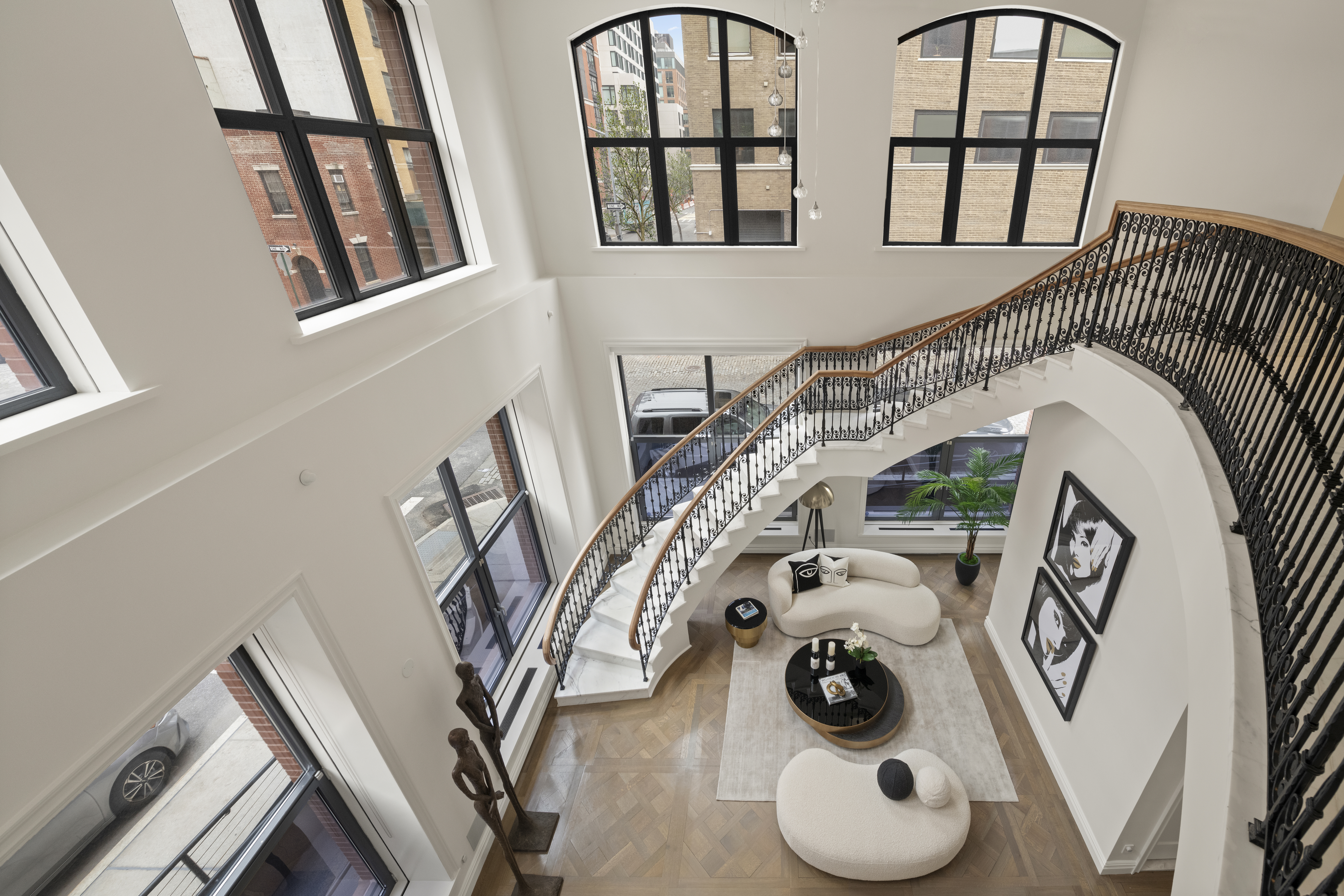 415 Washington Street, Unit 1B Manhattan, NY 10013 - Photo 3 of 16 a view of entryway and hall with wooden floor