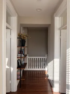 a view of entryway with wooden floor