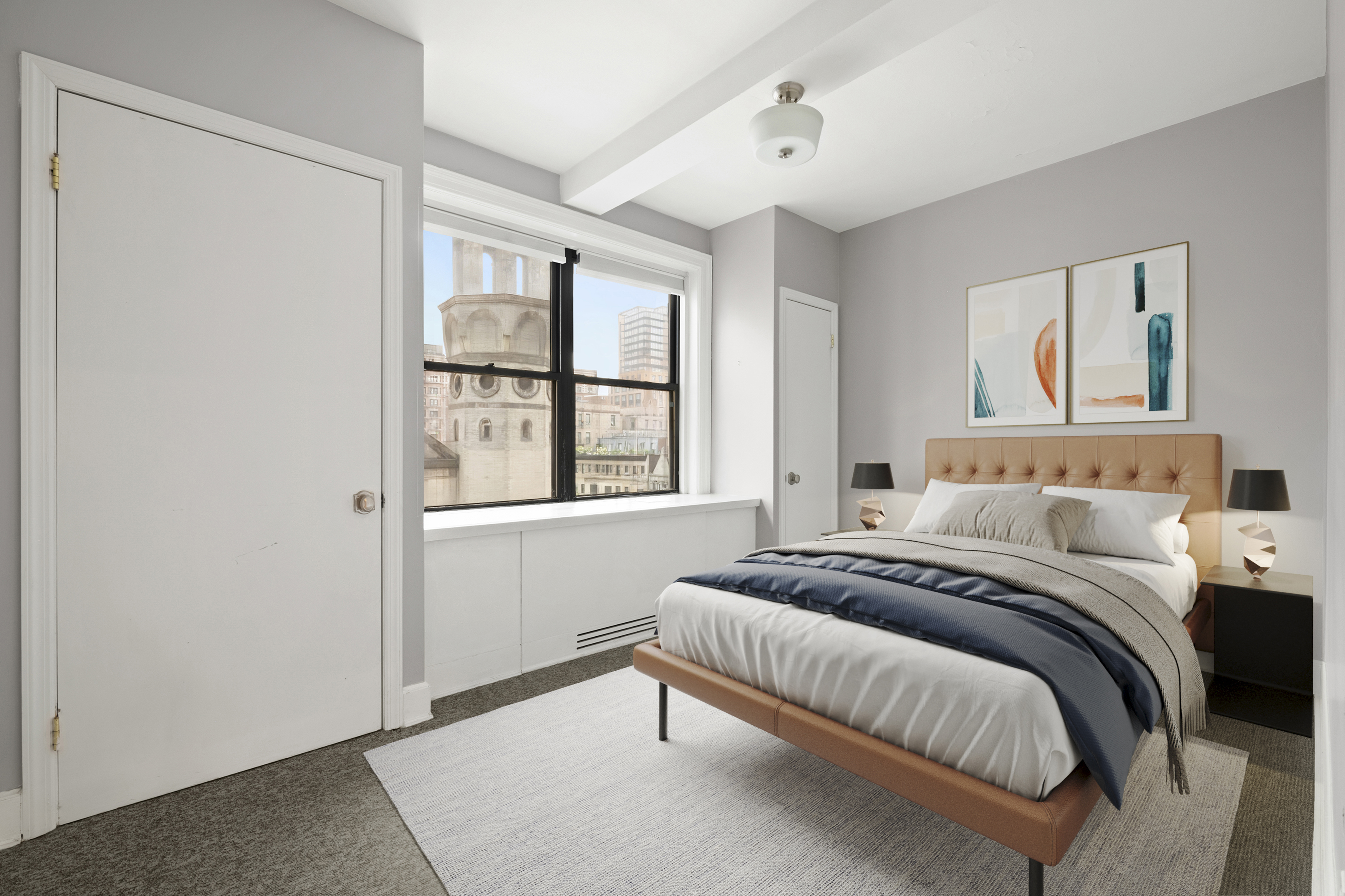 a bedroom with a bed and a window