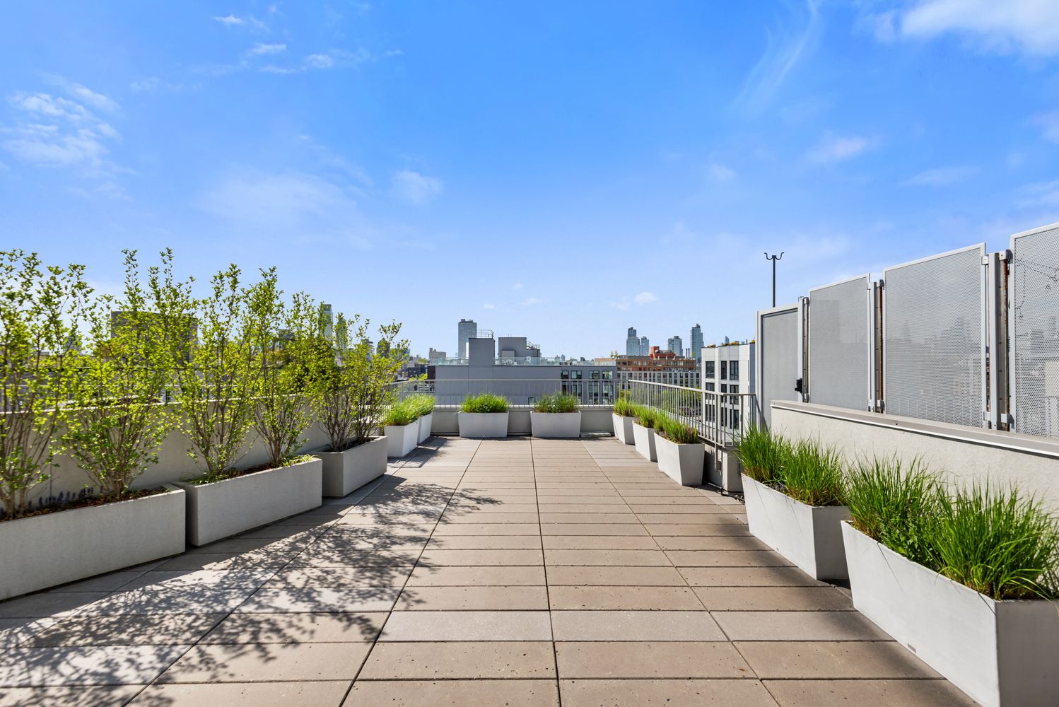 147 Hope Street, Unit 4I Brooklyn, NY 11211 - Photo 9 of 16 a view of a balcony with chairs