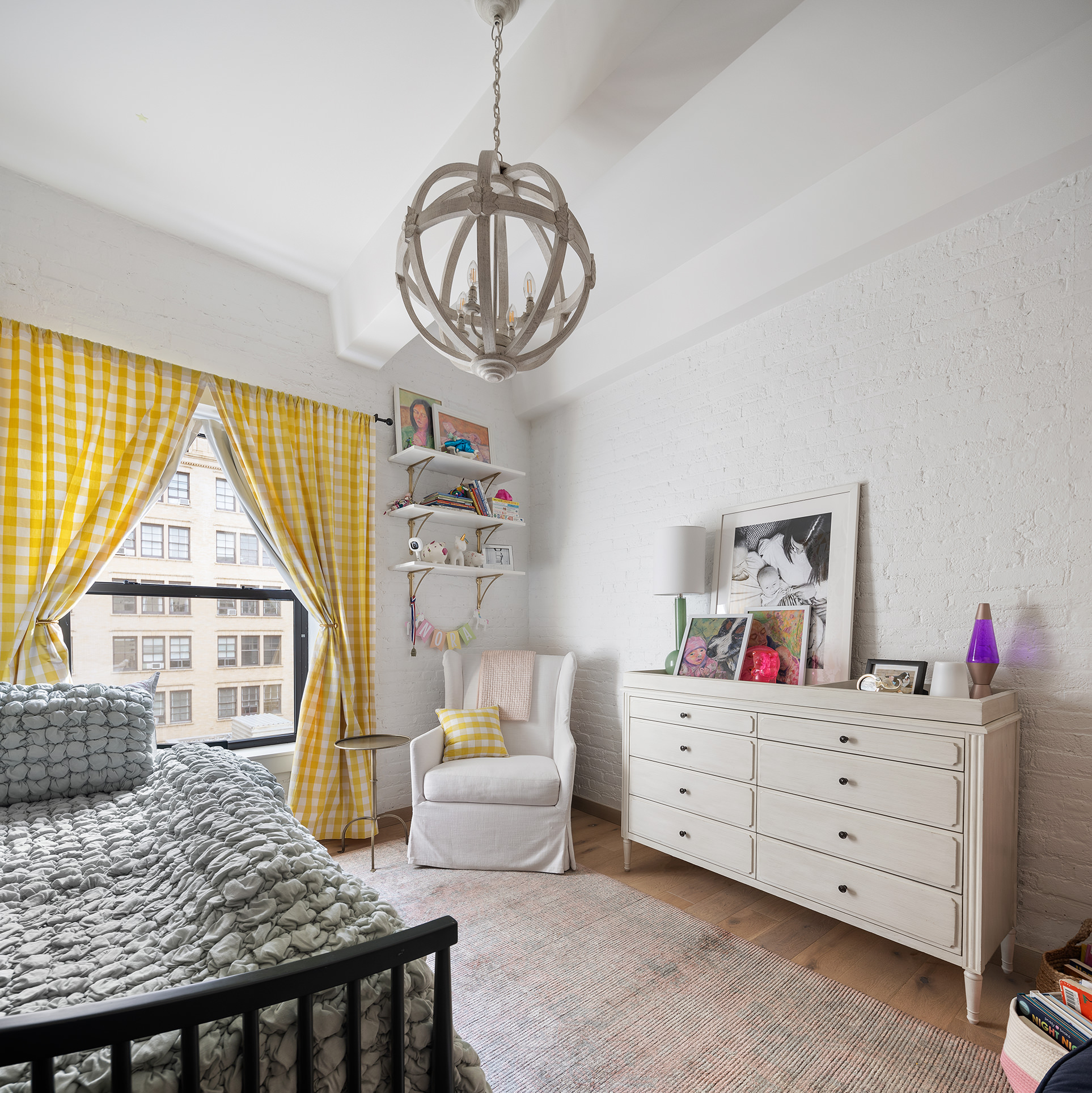 380 West 12th Street, Unit 6CD Manhattan, NY 10014 - Photo 14 of 19 a living room with furniture and a window
