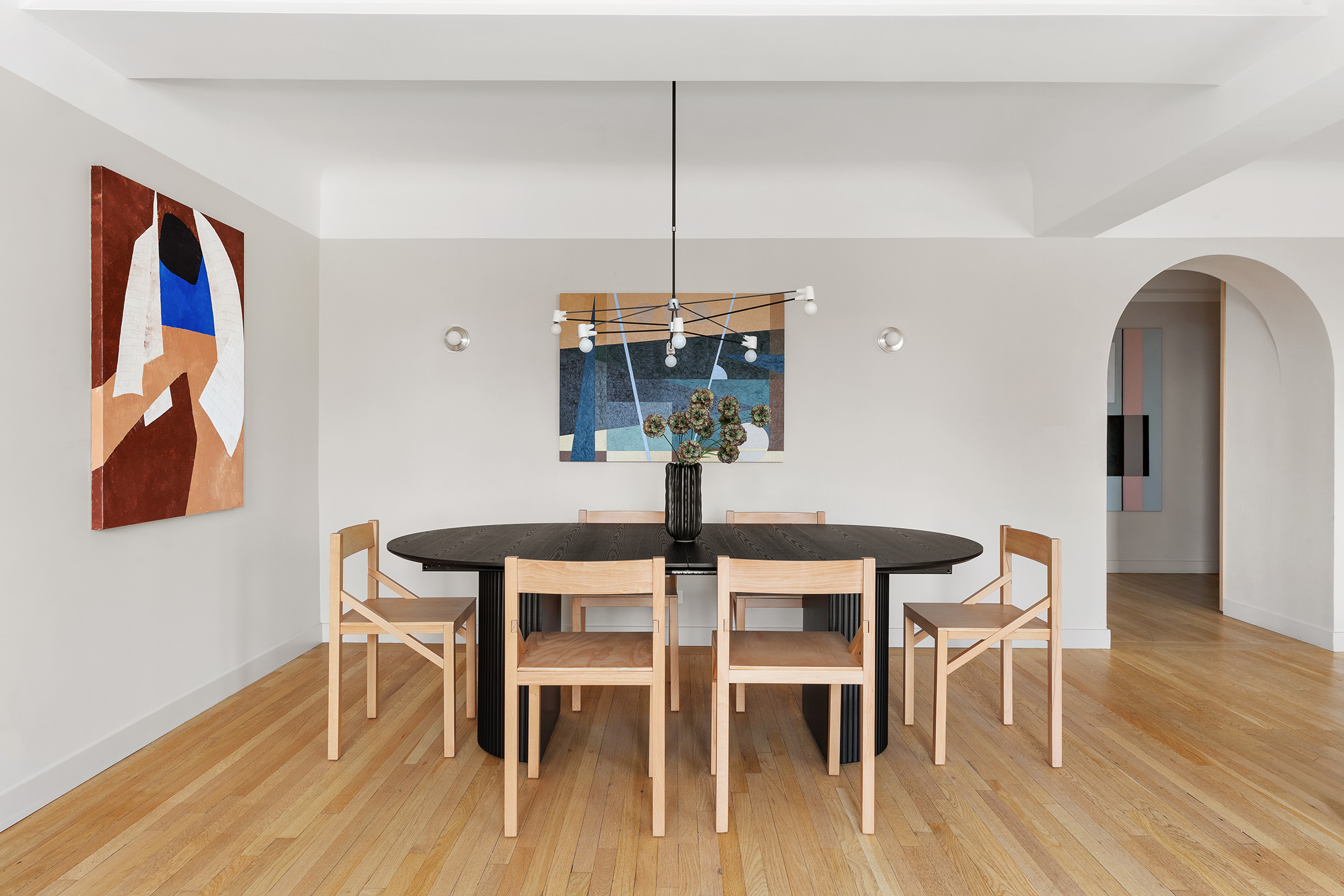 425 East 86th Street, Unit 11E Manhattan, NY 10028 - Photo 9 of 19 a dining room with furniture and wooden floor