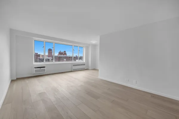 a view of kitchen and wooden floor