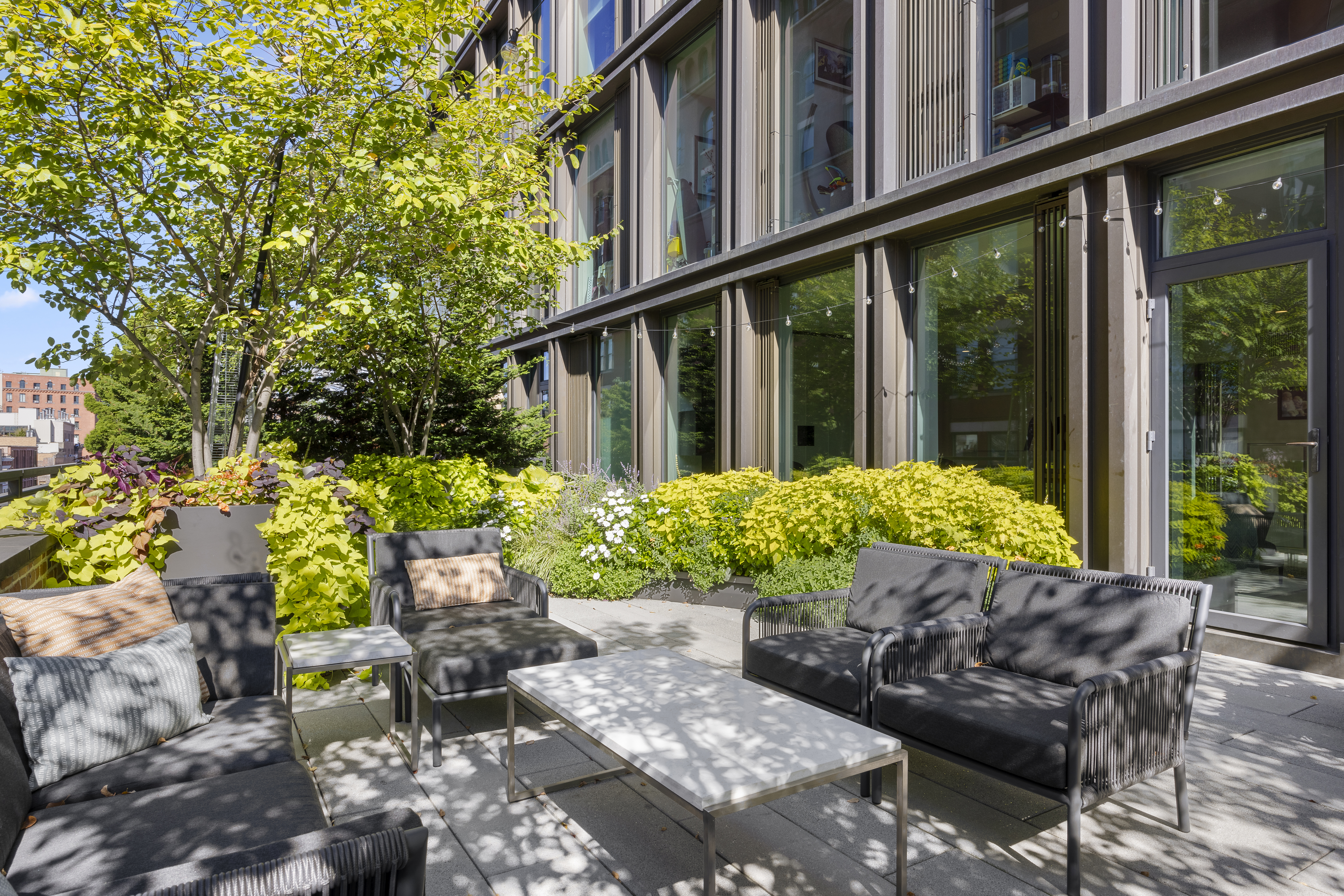 100 Barrow Street, Unit 7/8A Manhattan, NY 10014 - Photo 7 of 23 a view of a back yard of the house