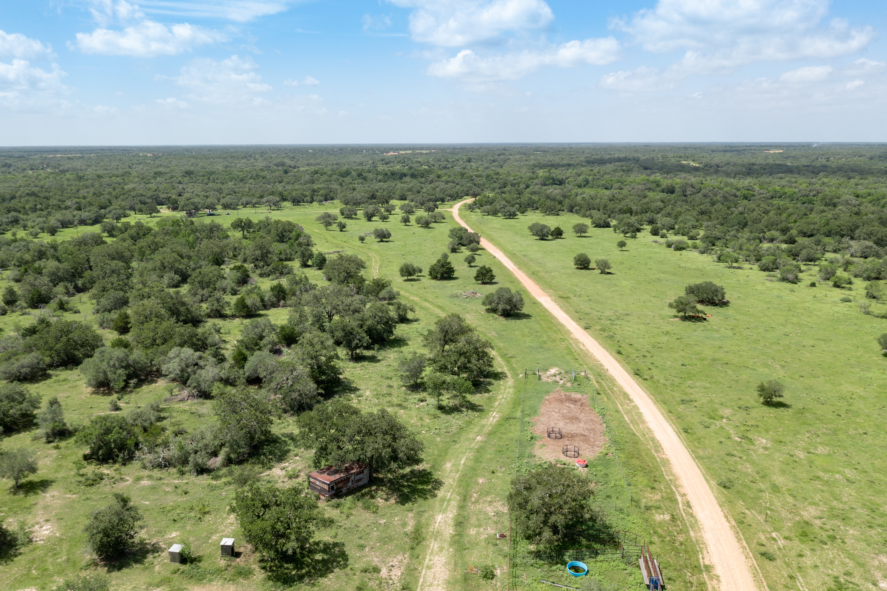 54.68 Cattle Guard Road Cuero, TX 77954 - Photo 57 of 67 an aerial view of residential houses with outdoor space