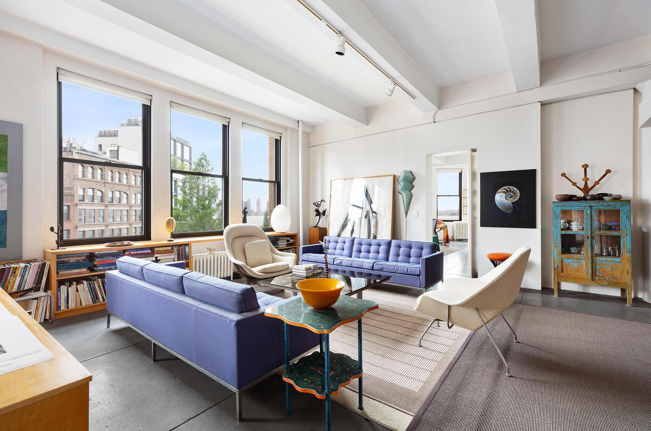 477 Washington Street Manhattan, NY 10013 - Photo 3 of 20 a living room with furniture and a large window