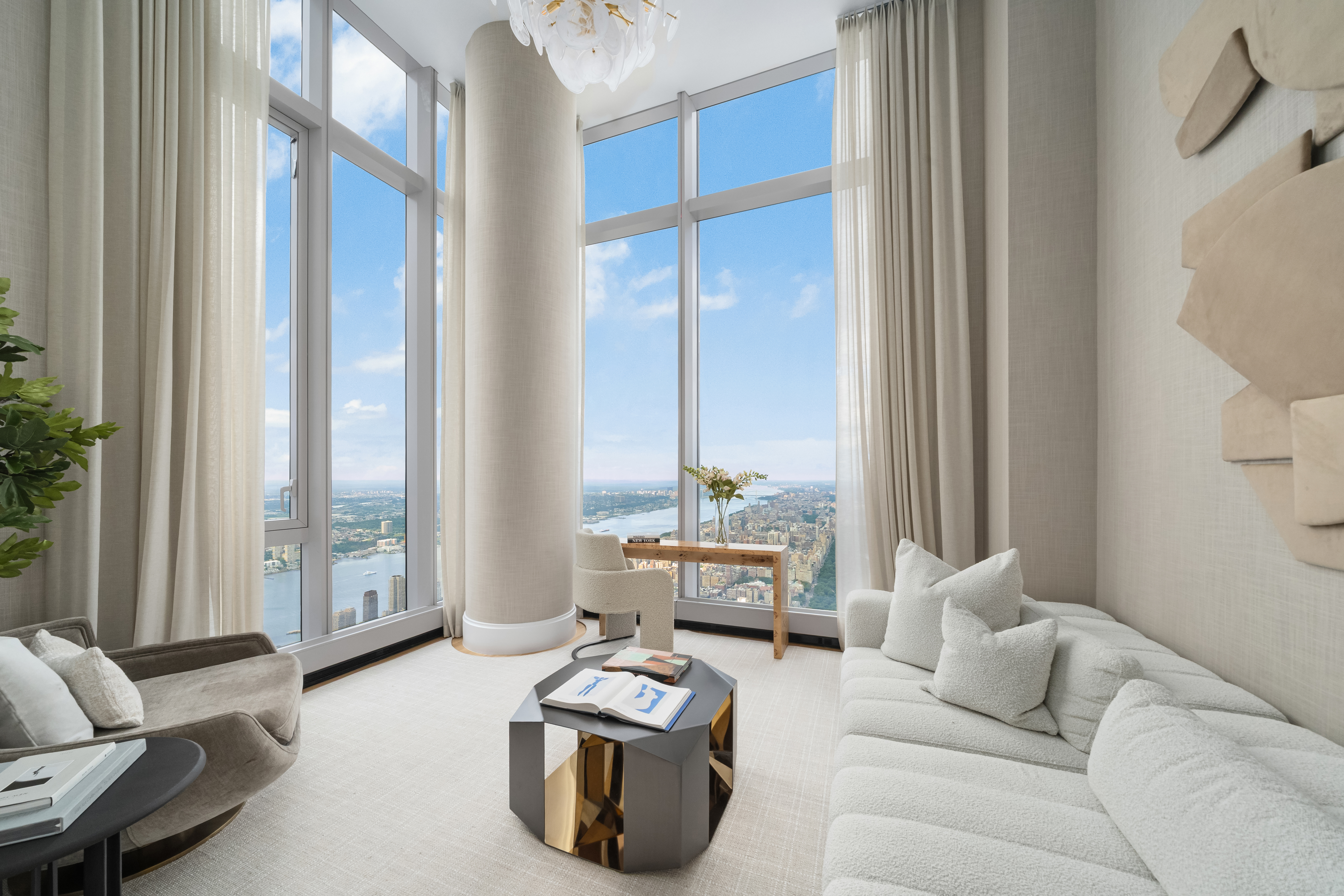 217 West 57th Street, Unit 127/128 Manhattan, NY 10019 - Photo 10 of 36 a living room with furniture and a large window