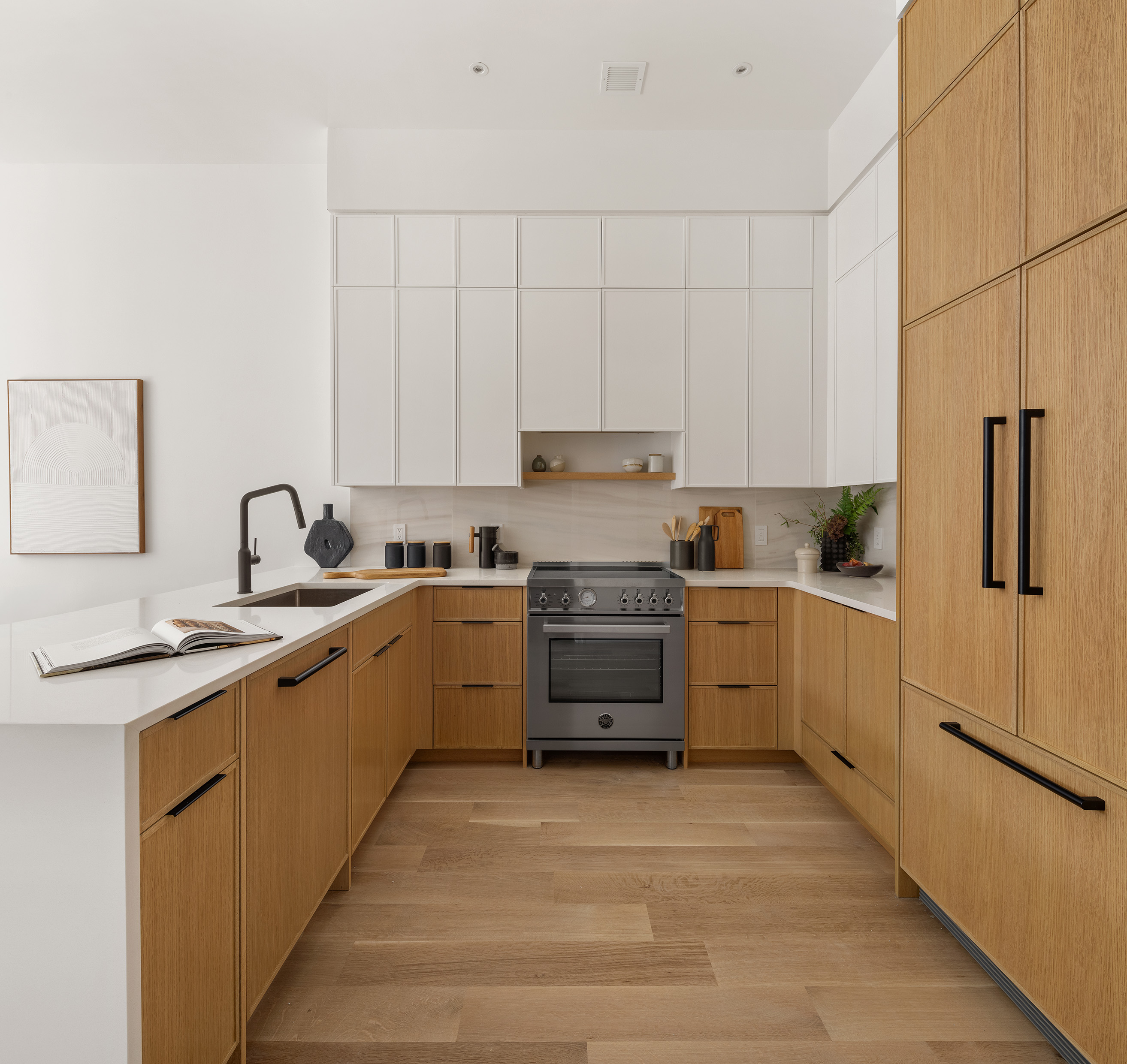 265 20th Street, Unit 3R Brooklyn, NY 11215 - Photo 2 of 6 a kitchen with granite countertop white cabinets and stainless steel appliances