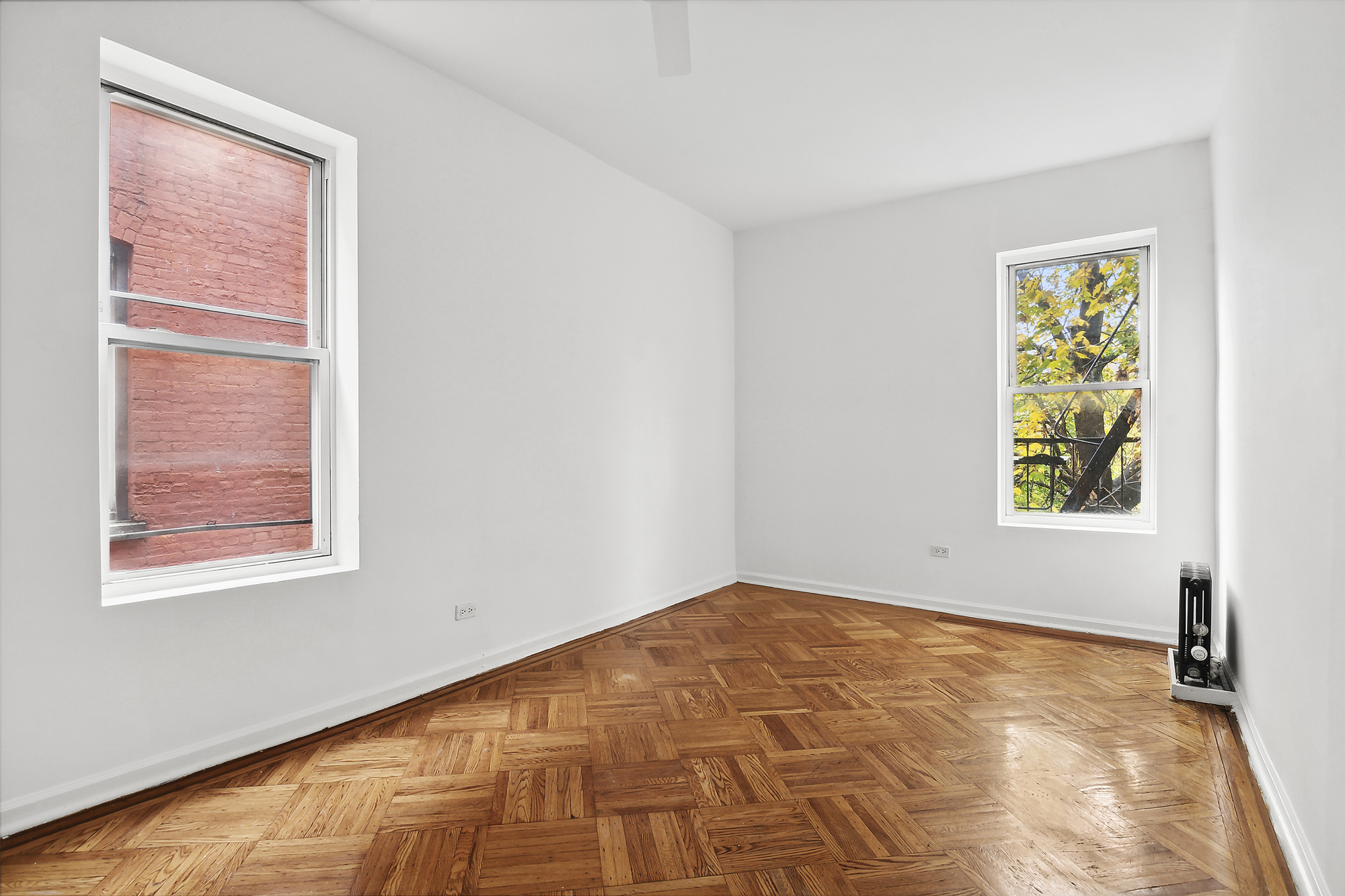 244 New York Avenue, Unit 3L Brooklyn, NY 11216 - Photo 2 of 7 a view of an empty room with a window