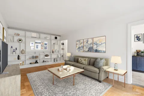 a living room with furniture and a rug