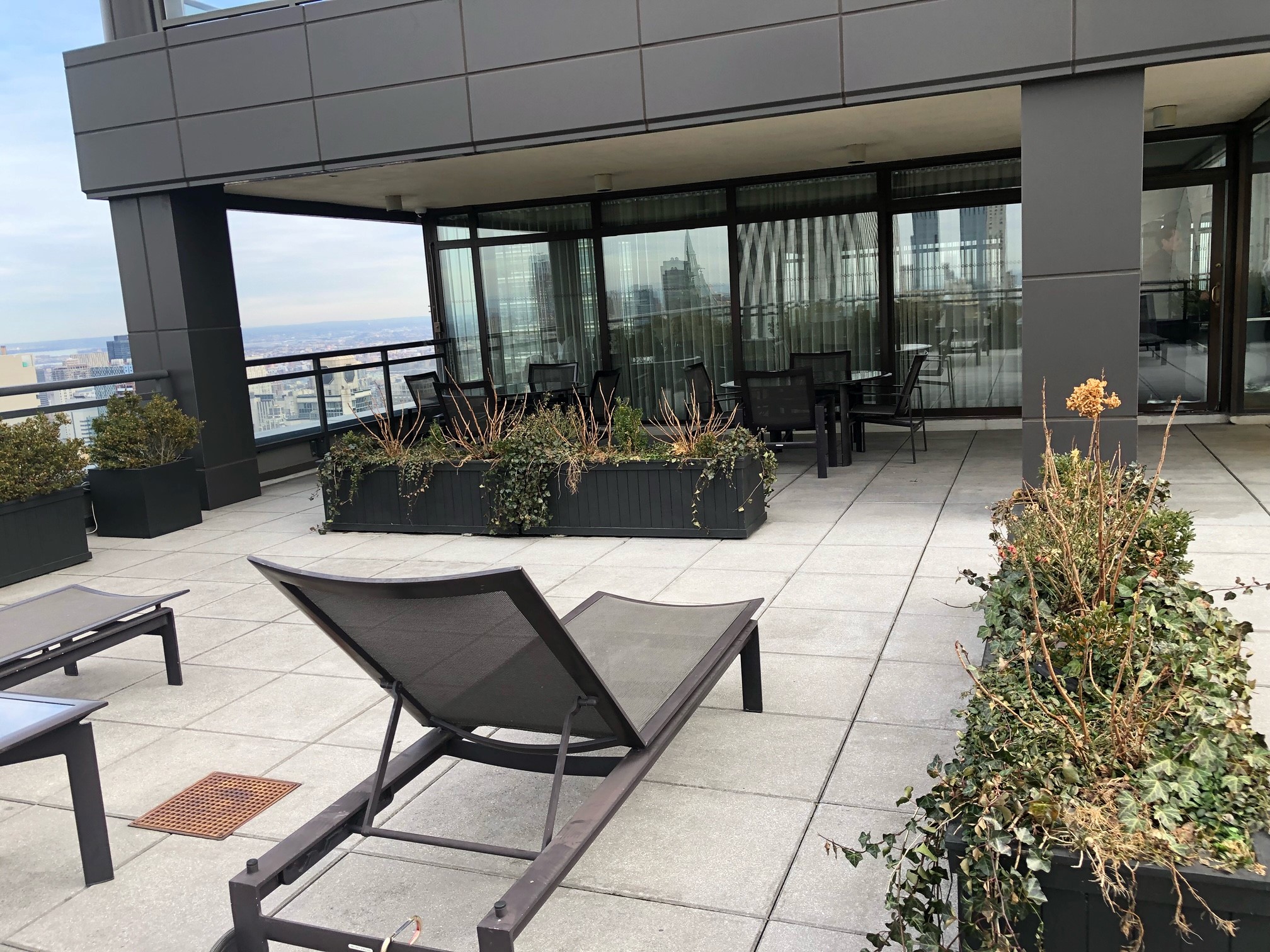 117 East 57th Street, Unit 21H Manhattan, NY 10022 - Photo 25 of 26 a view of an outdoor dining space with furniture