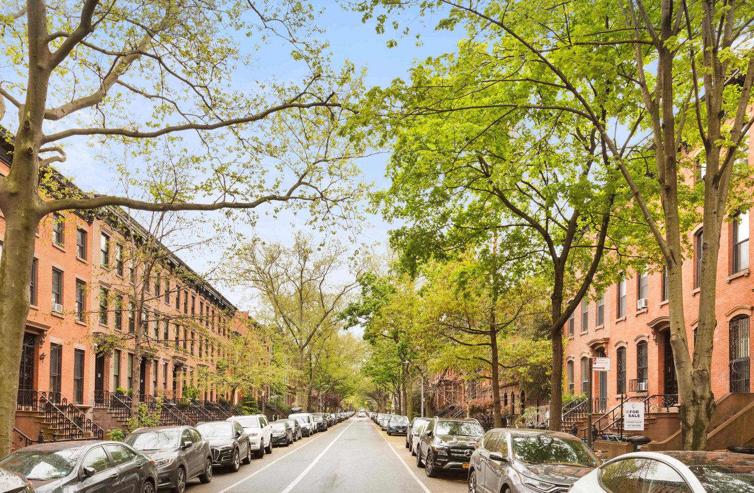 214 Carlton Avenue, Unit 2 Brooklyn, NY 11205 - Photo 15 of 16 a row of cars parked in front of brick building