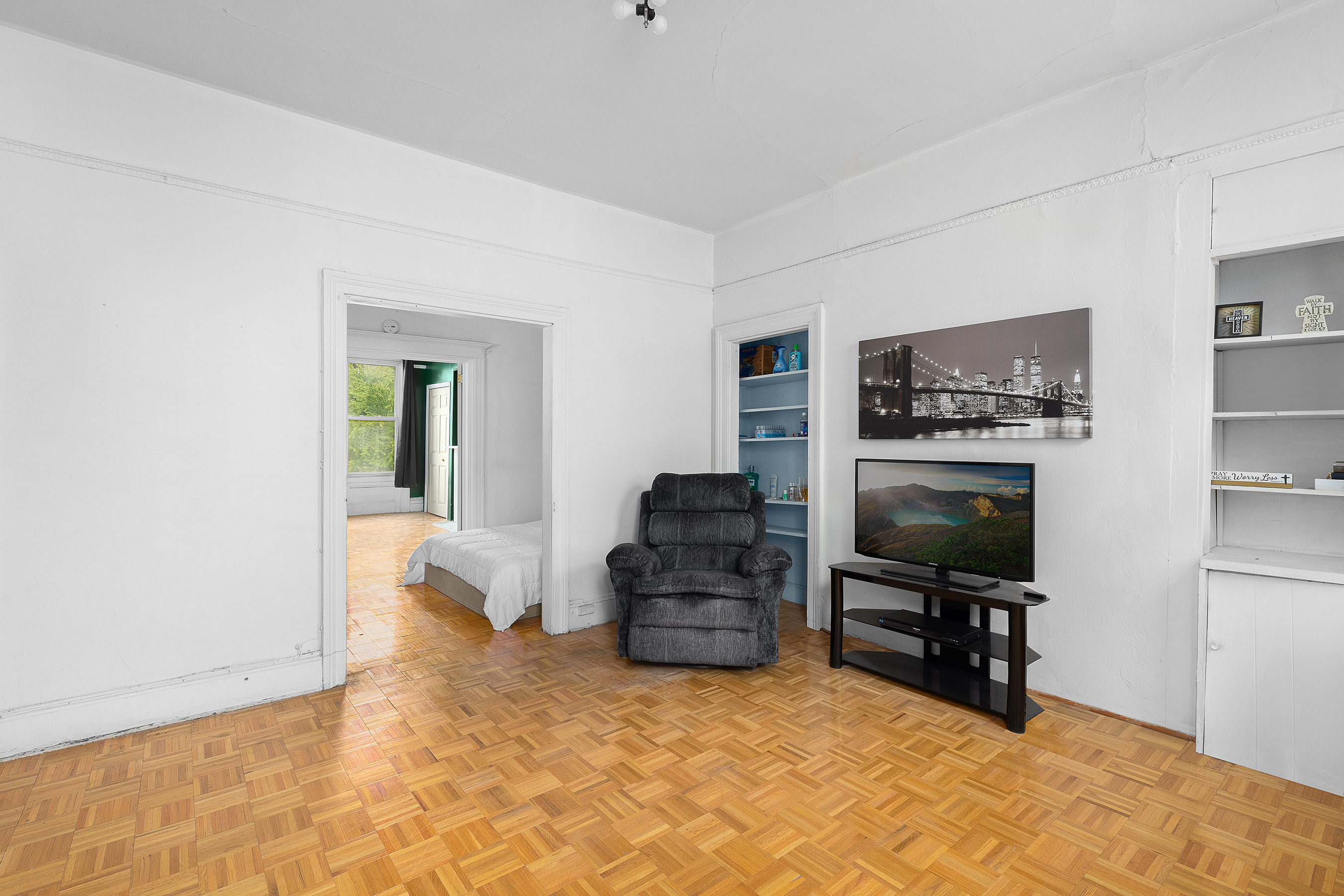 39 Broome Street Brooklyn, NY 11222 - Photo 7 of 16 a living room with furniture and a flat screen tv