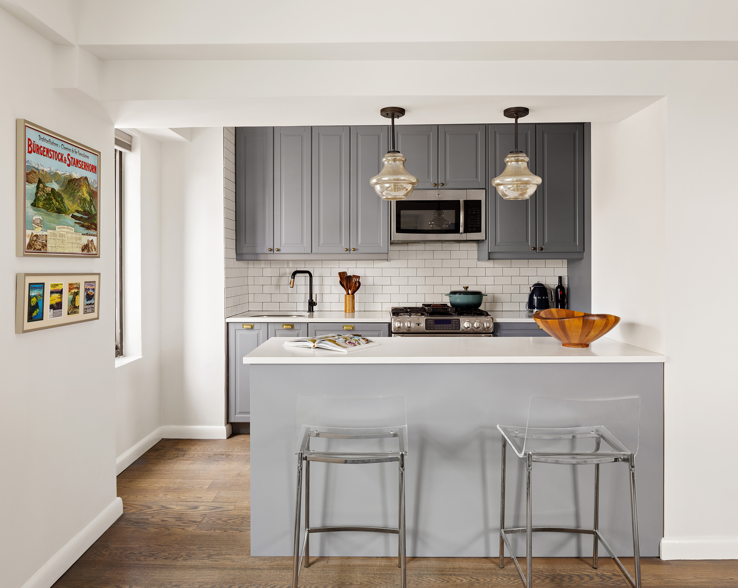 10 East End Avenue, Unit 18D Manhattan, NY 10075 - Photo 6 of 21 a kitchen with a sink cabinets and window