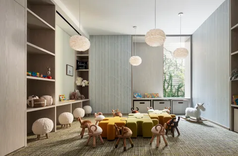 a bed room with furniture and a window