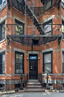 a picture of a book and a bed